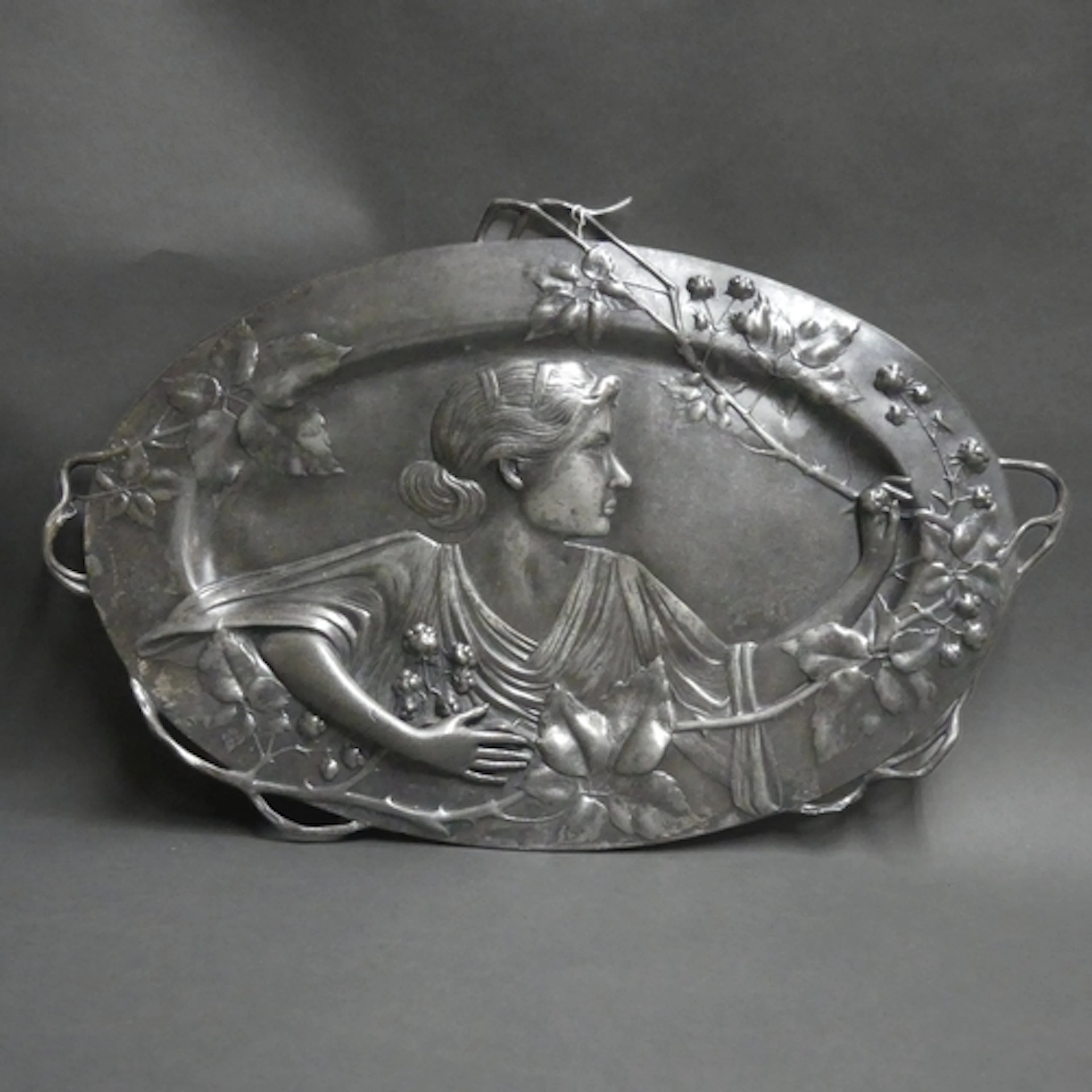 WMF - An Art Nouveau silver plated oval footed shallow tray,...