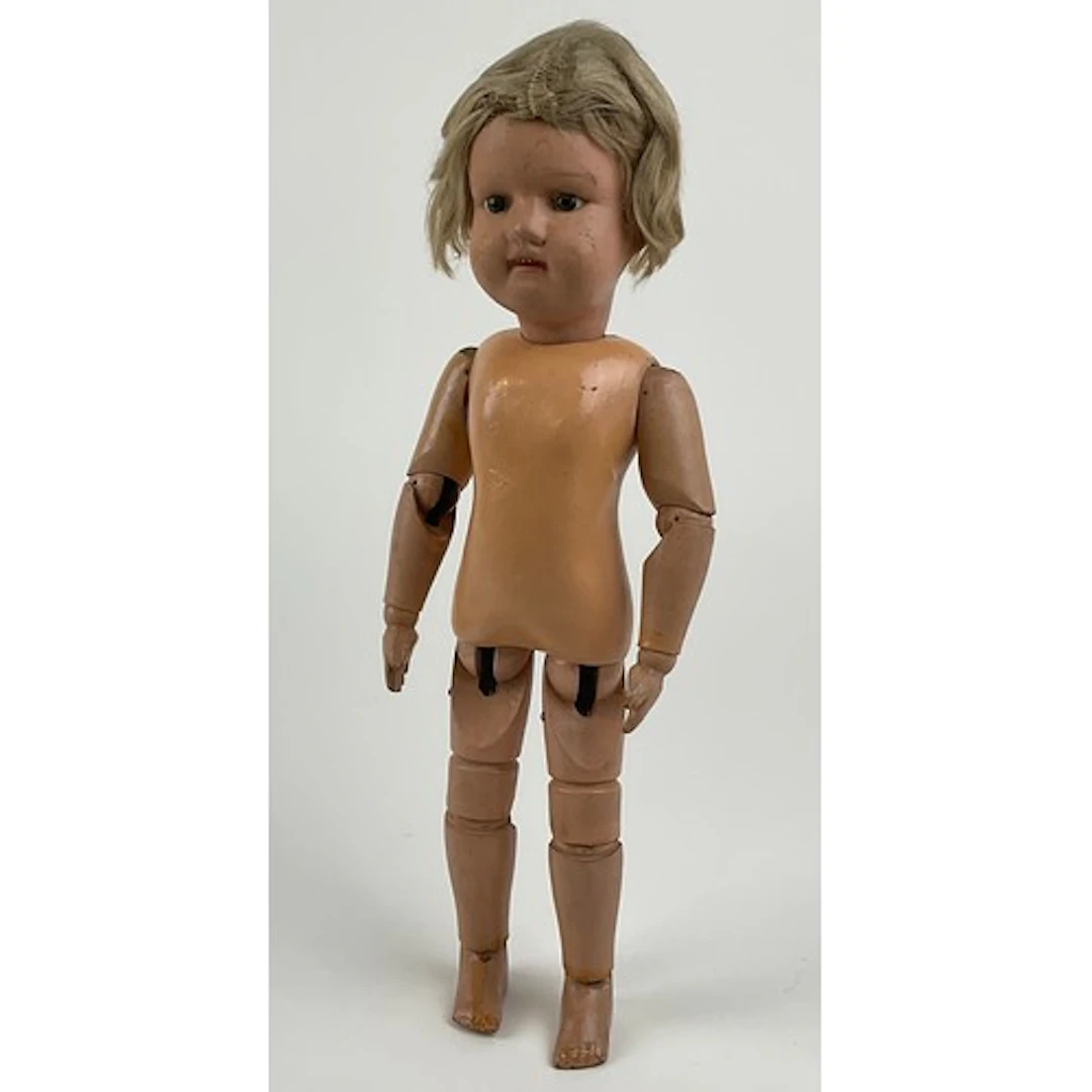 Dolls - A scarce 20th century American wooden doll by Schoen...