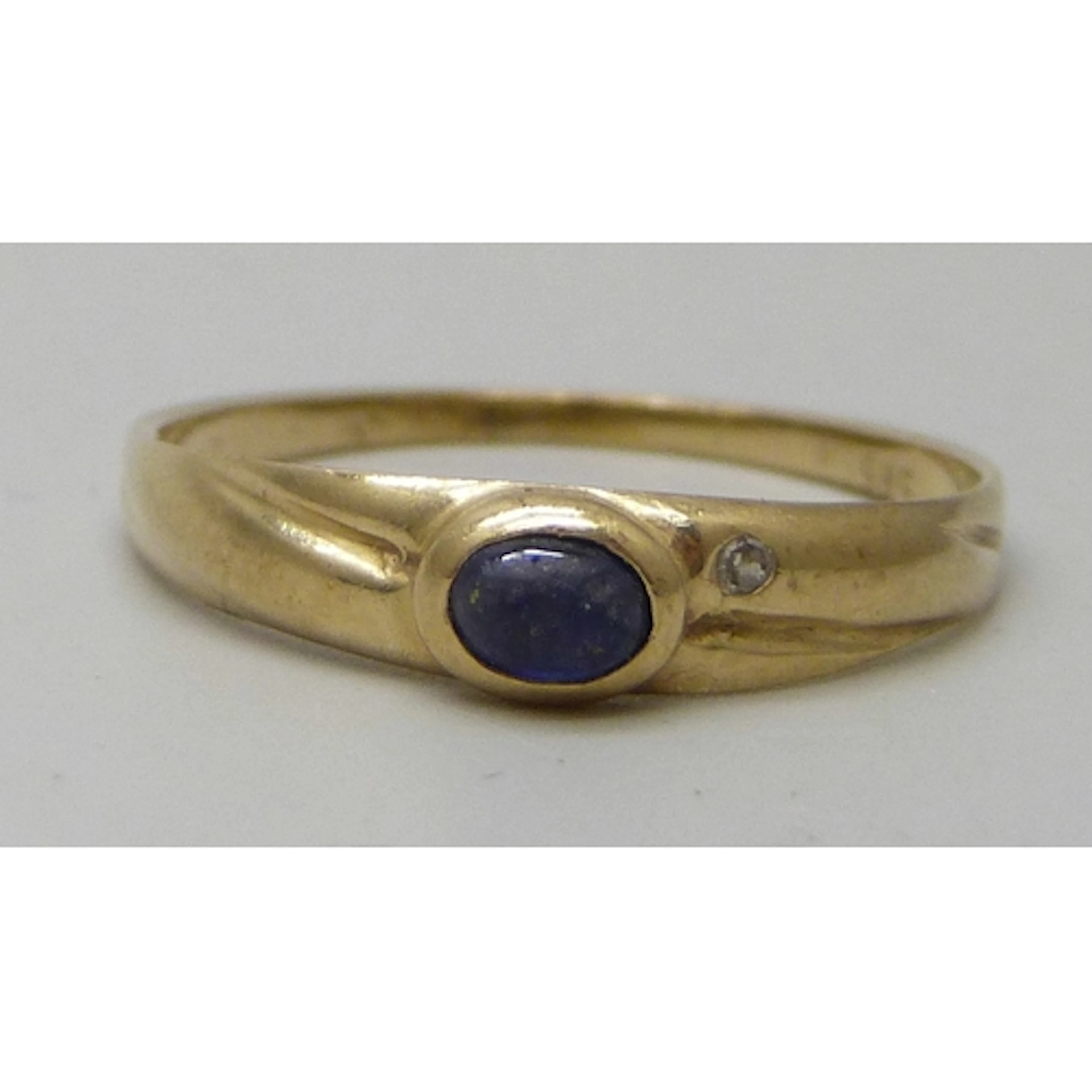 A 14k gold, sapphire and diamond ring (sapphire a/f), 1.3g, ...