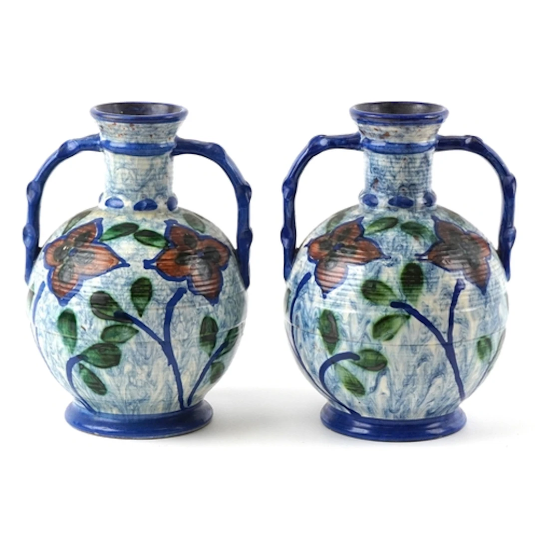 Pair of Swedish twin handled pottery vases hand painted with...