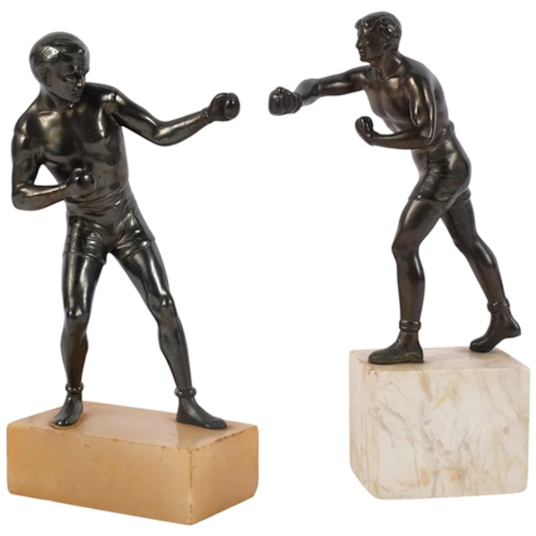 2 similar bronze-effect figures of boxers, on stone plinths,...