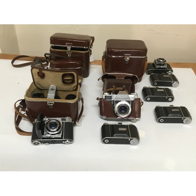 10 Kodak cameras. 1 Retina Reflex S with additional capabili...