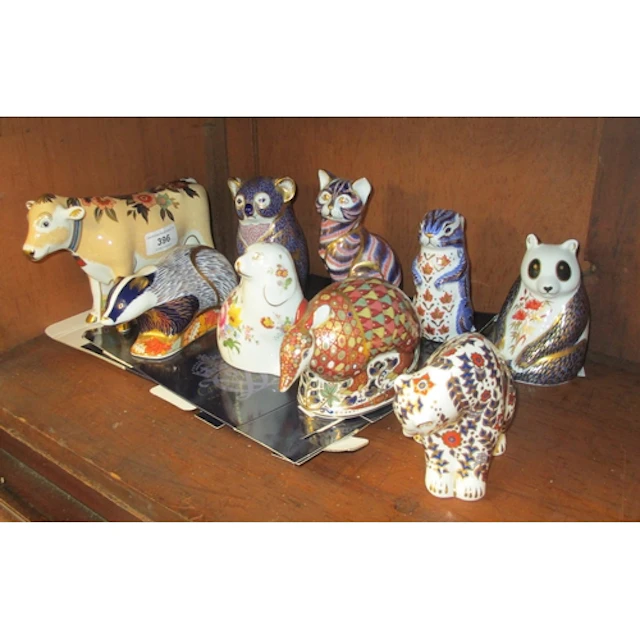Group of nine Royal Crown Derby paperweights, ' Lily ', ' Ar...
