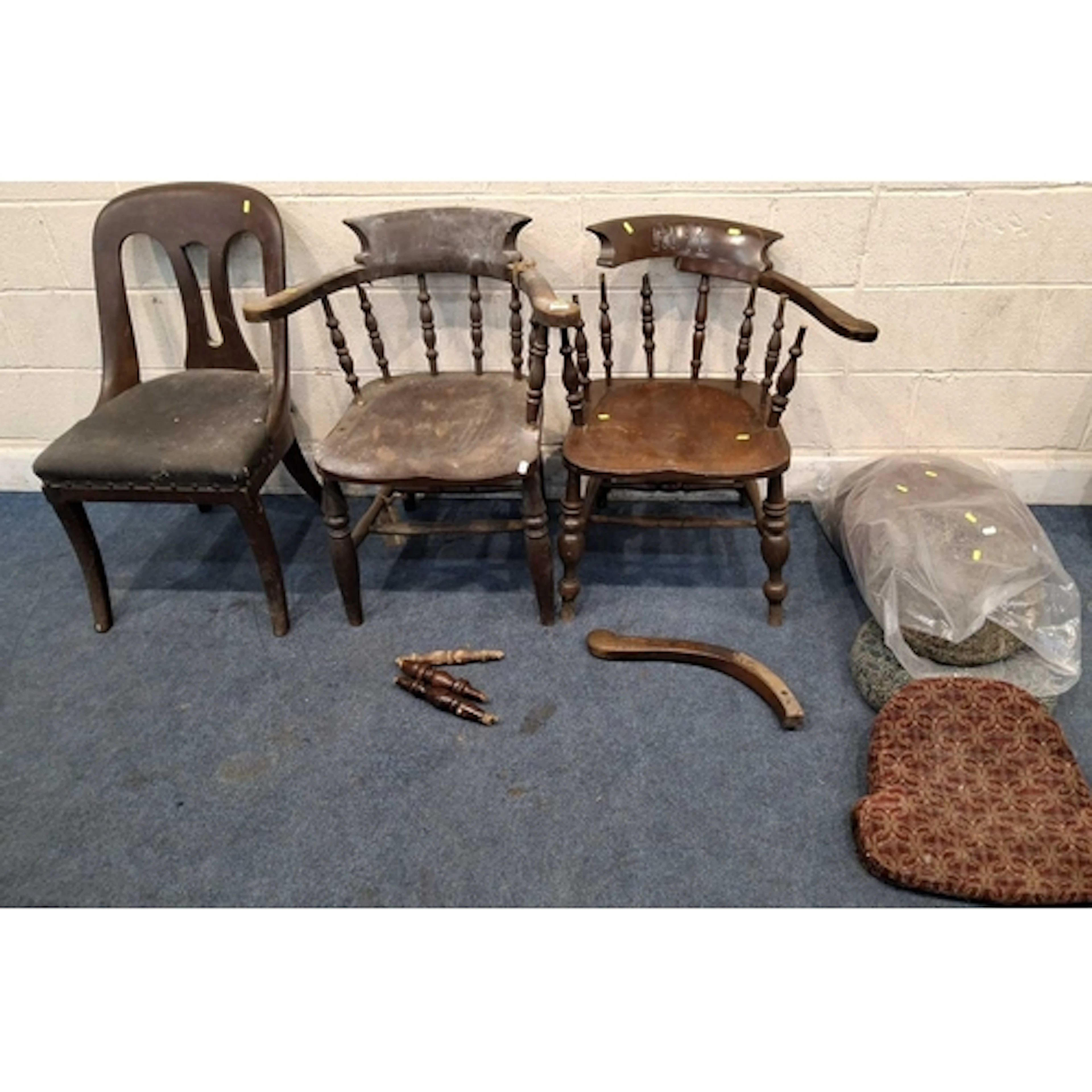 TWO EARLY 20TH CENTURY BOW TOP CAPTAINS CHAIRS, one carved M...