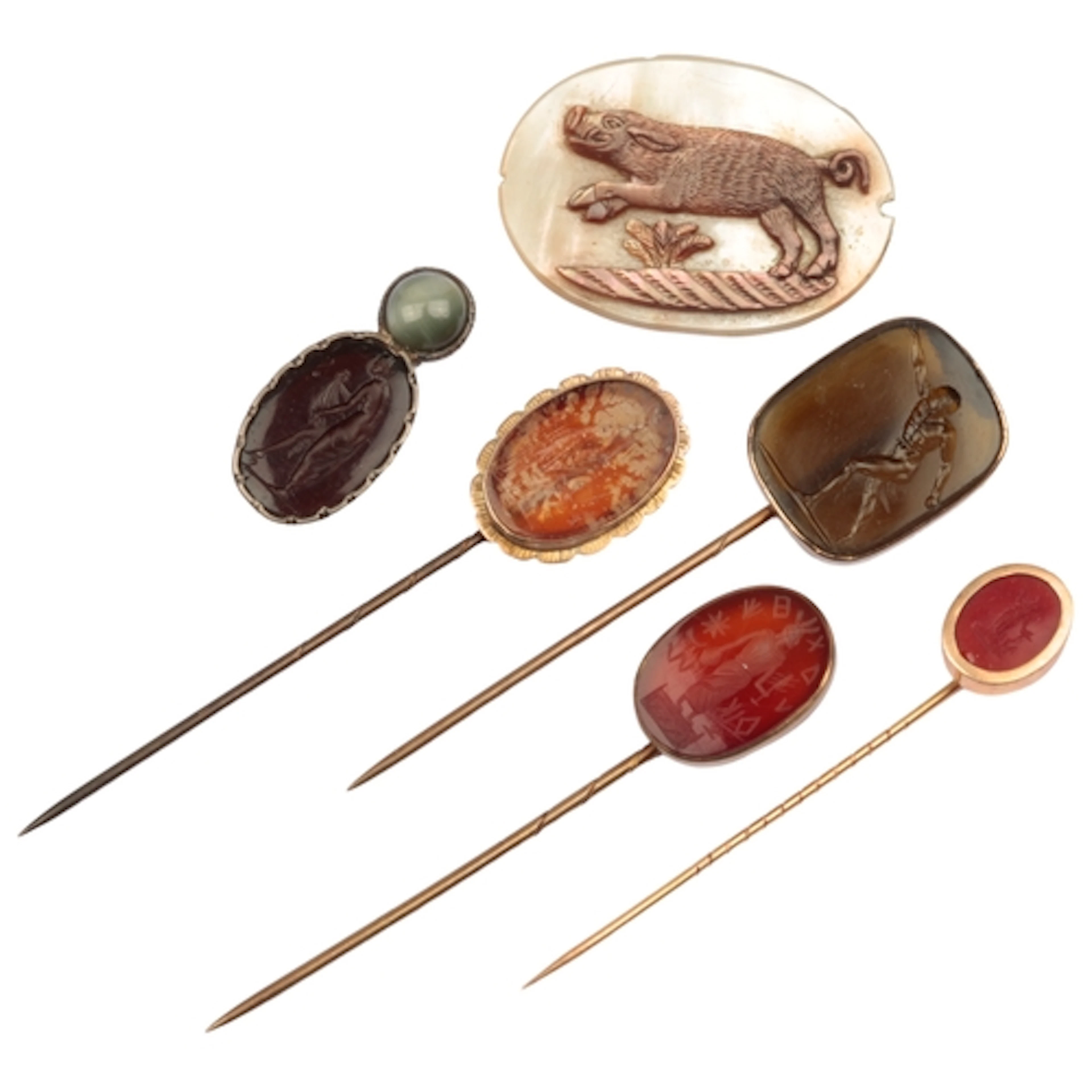 A collection of cameos and intaglios, comprising: a glass in...