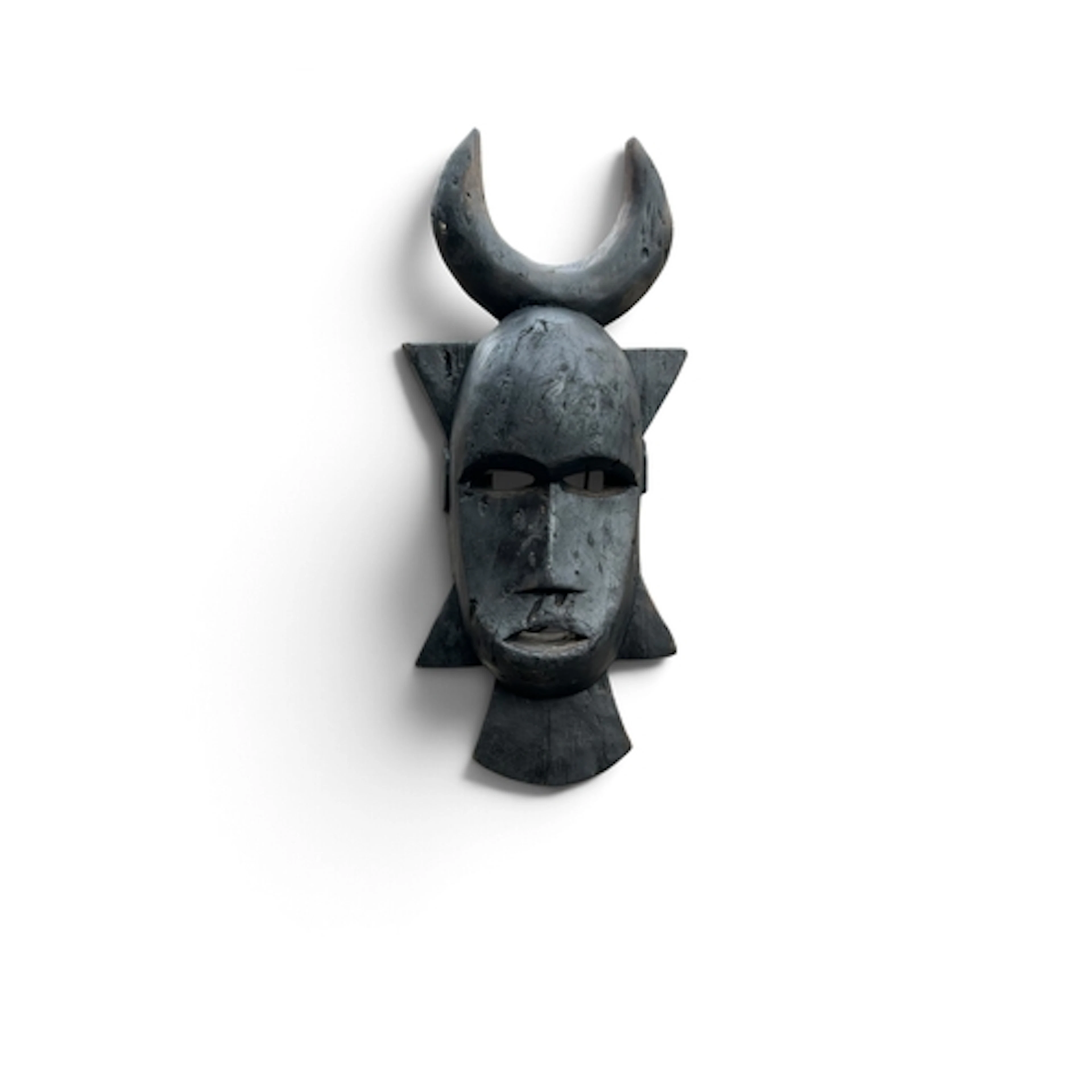 A NJIMINI MASK FROM THE IVORY COAST Does not include stand. ...