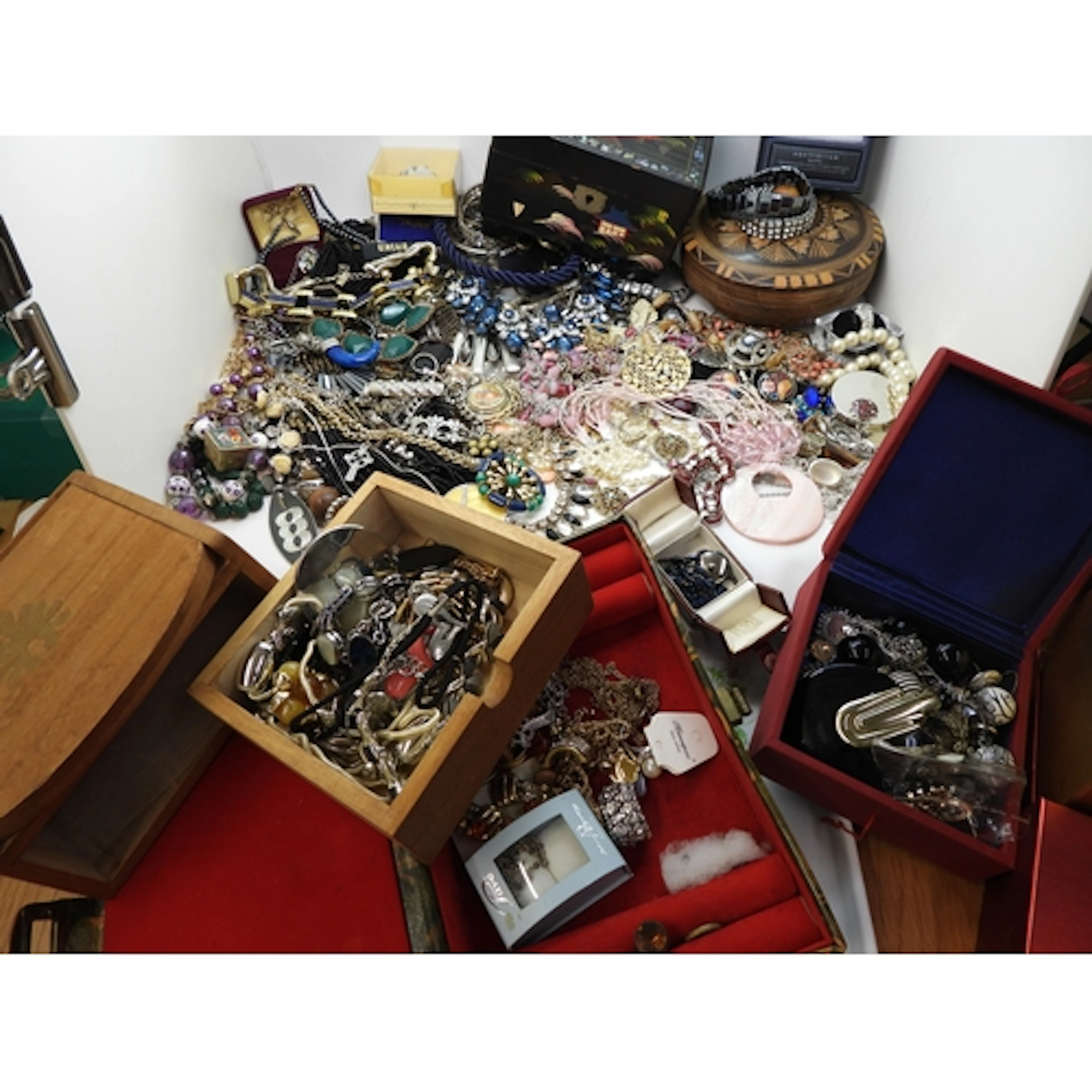 A large collection of vintage and modern costume jewellery t...