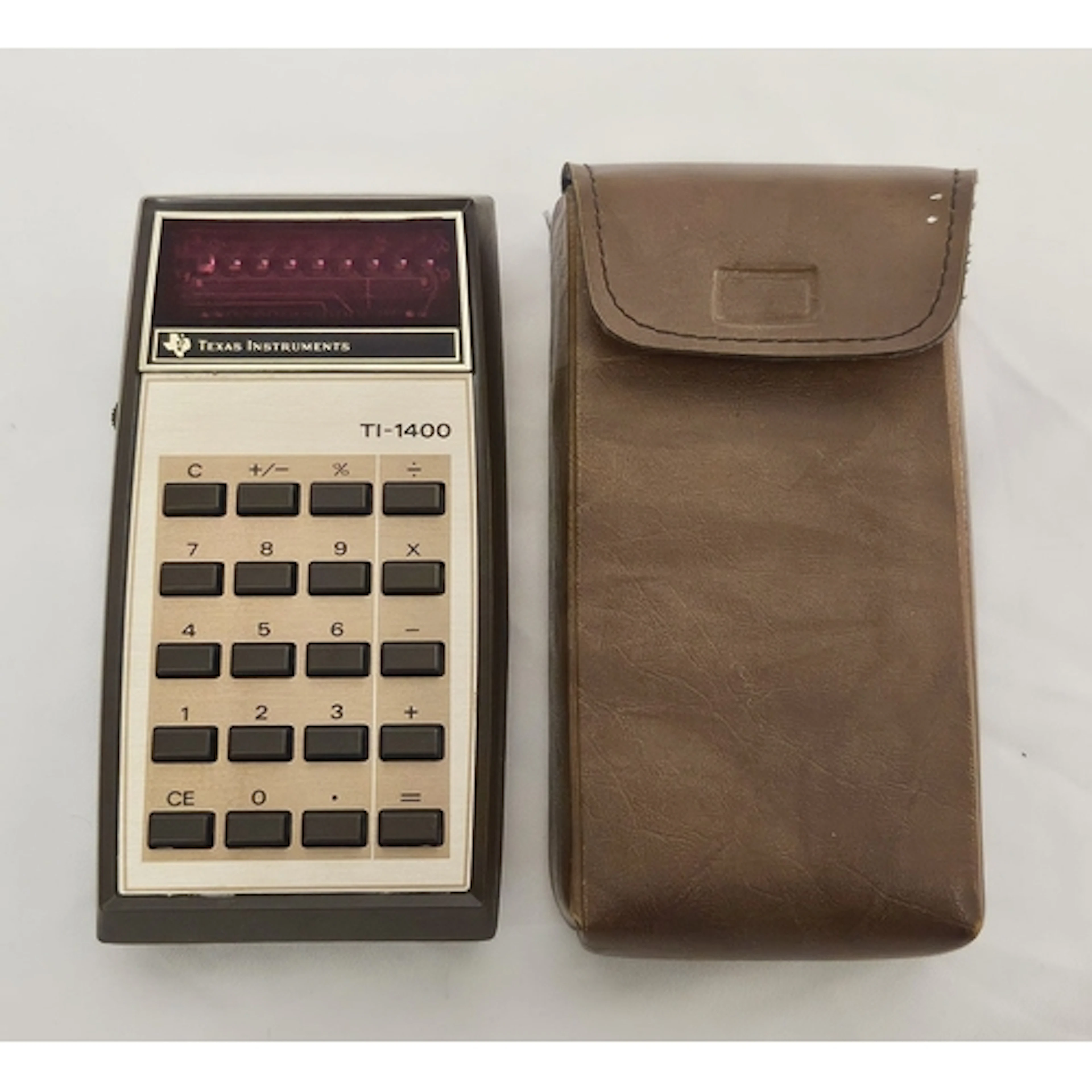Vintage Texas Instruments TI-1400 Calculator in brown vinyl ...