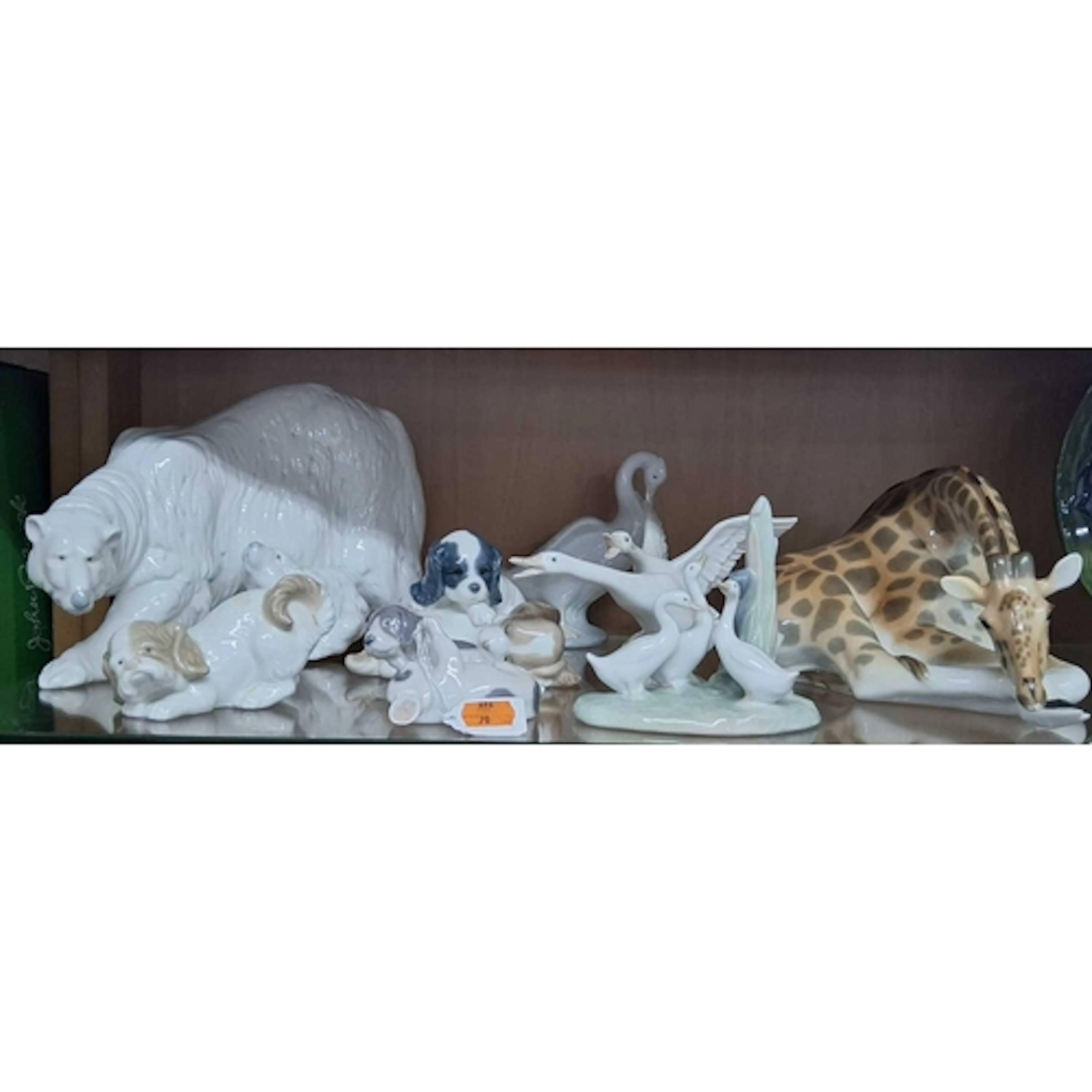 A GROUP OF ANIMAL RELATED SCULPTURES, comprising a resting g...