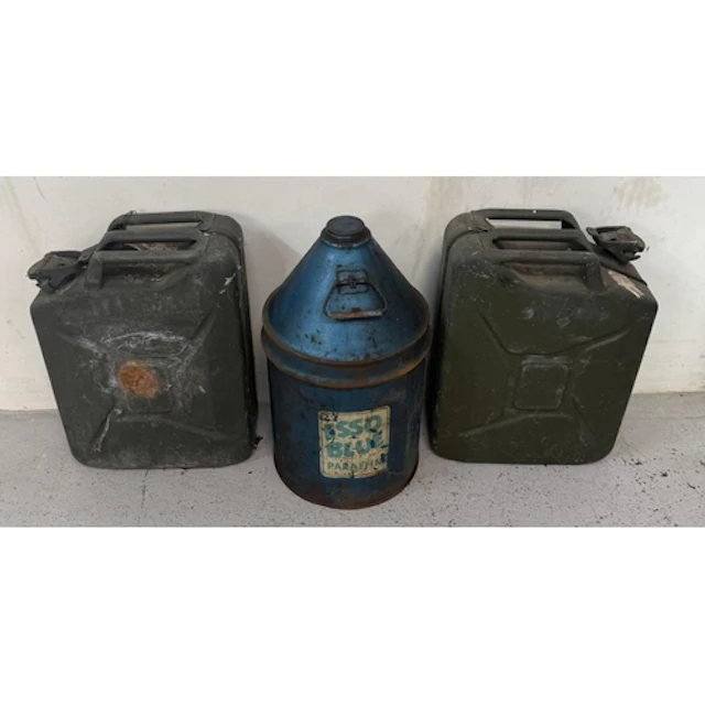 A vintage Esso Blue Paraffin can and two Jerry cans.