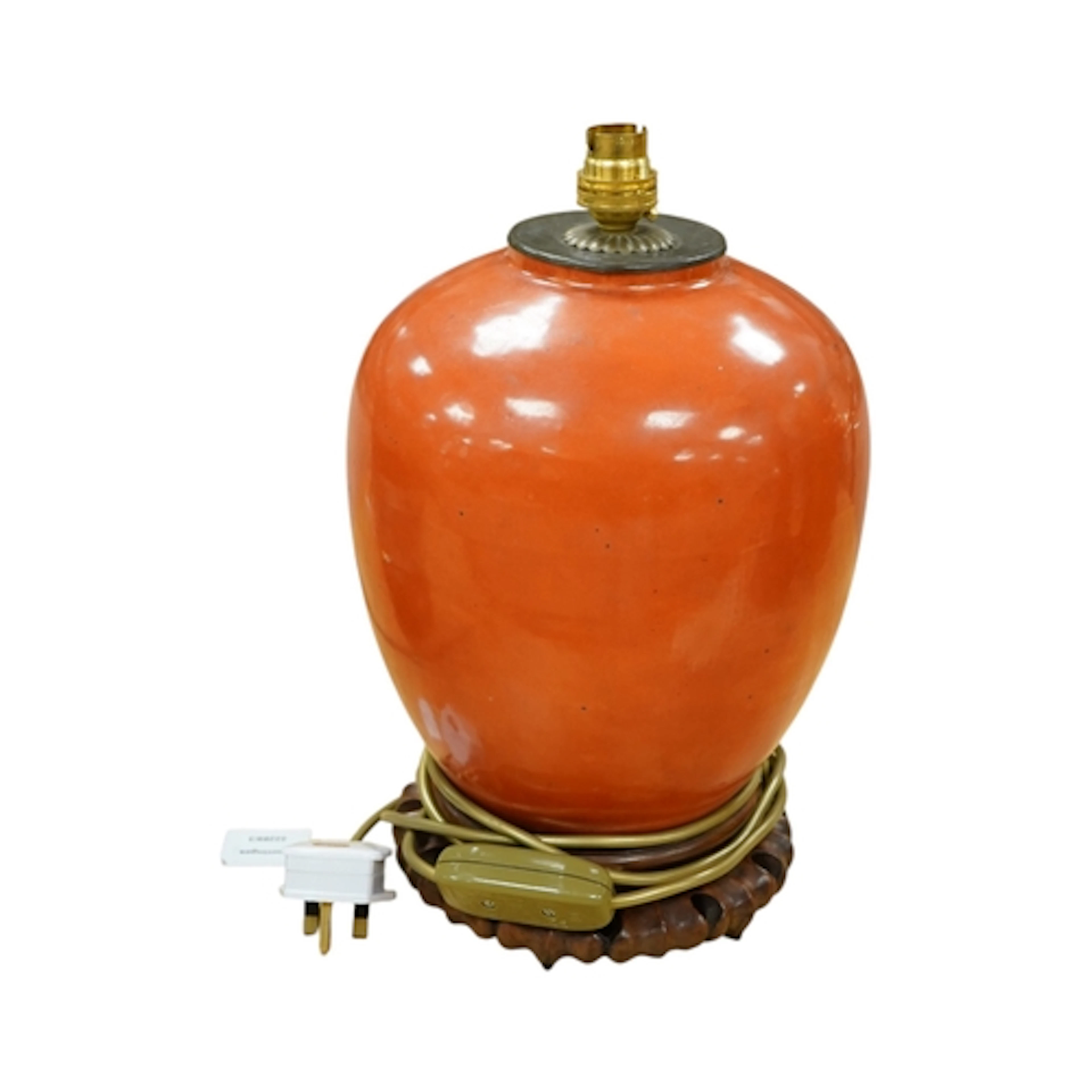 A 19th century Chinese coral ground ovoid jar, drilled and m...