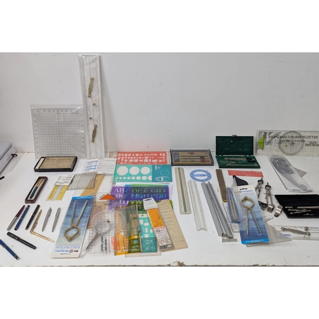 Fountain pens, measuring implements, alphabet stencils and o...