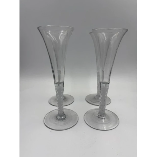 A set of four Georgian air twist stem ale glasses.