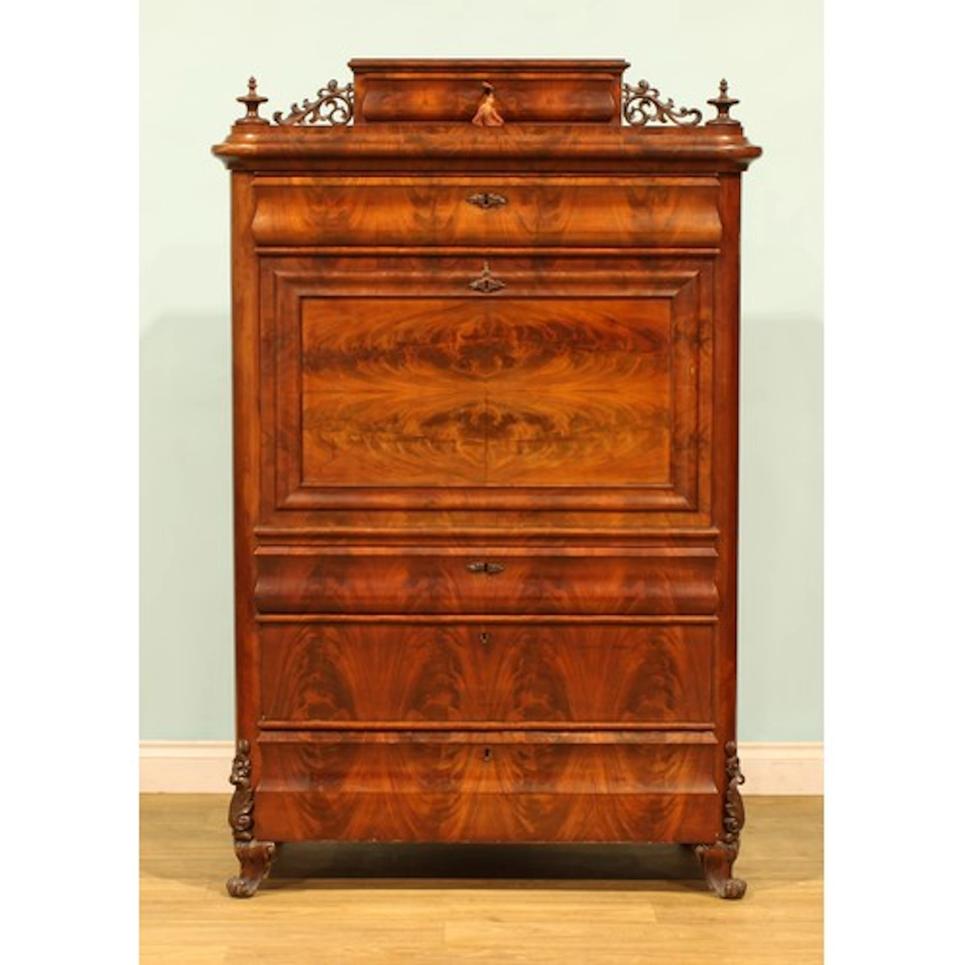 A 19th century Biedermeier mahogany secretaire, the top with...