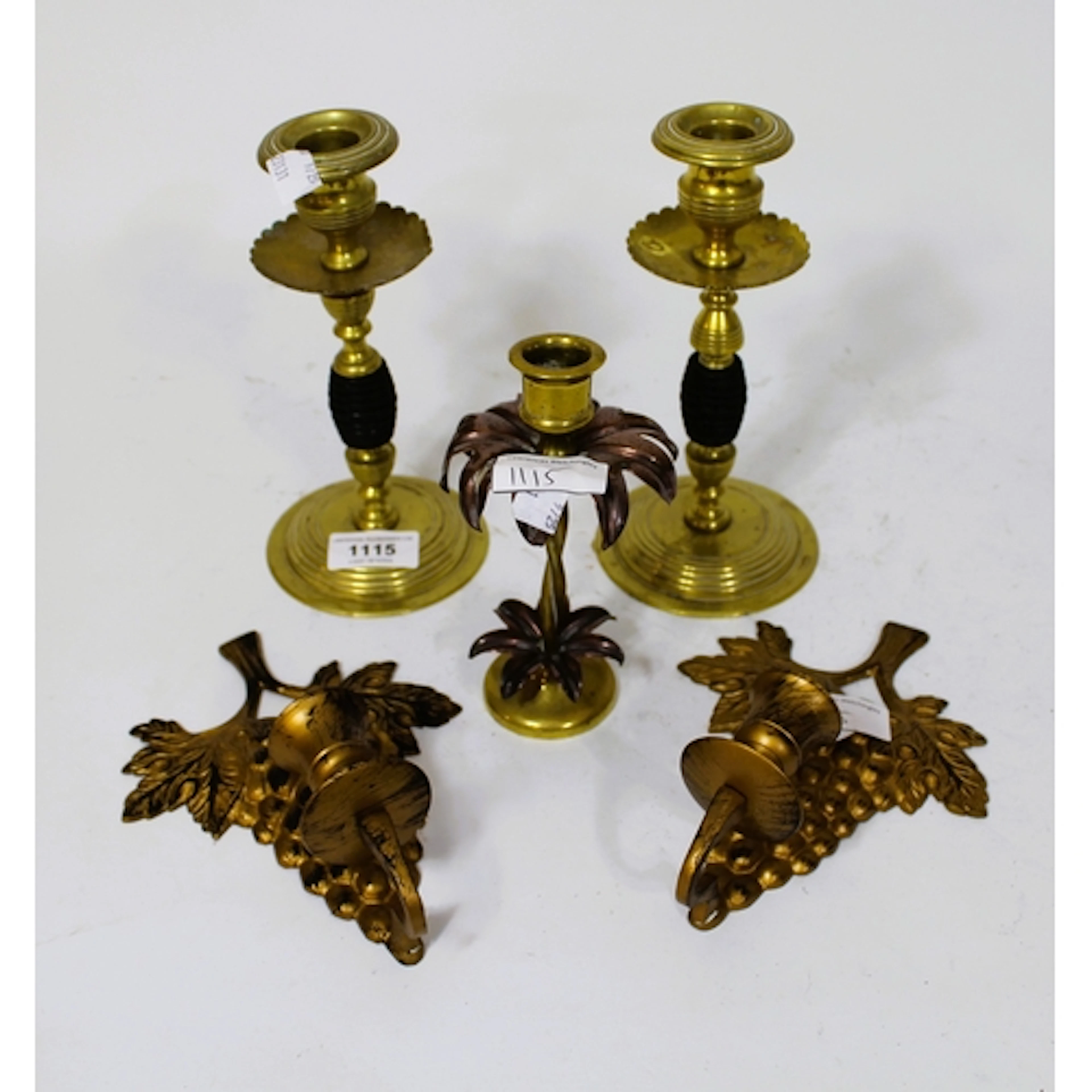 Pair of brass circular candlesticks, brass and metal candles...