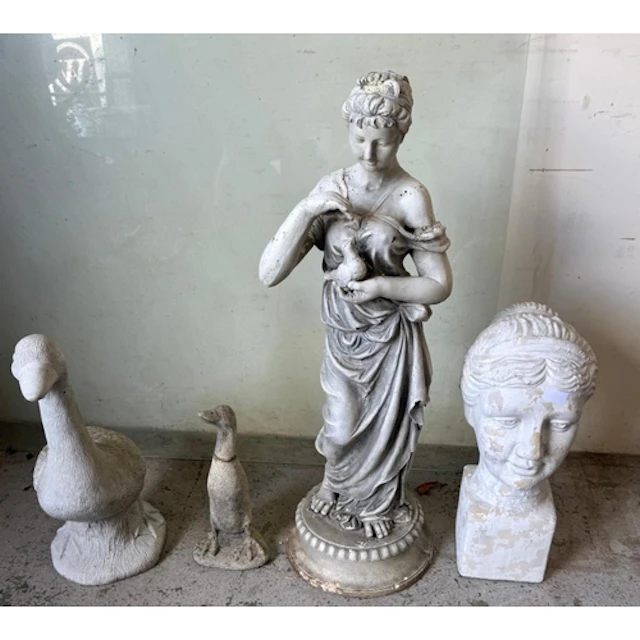 A Selection of plaster and concrete garden statues to includ...