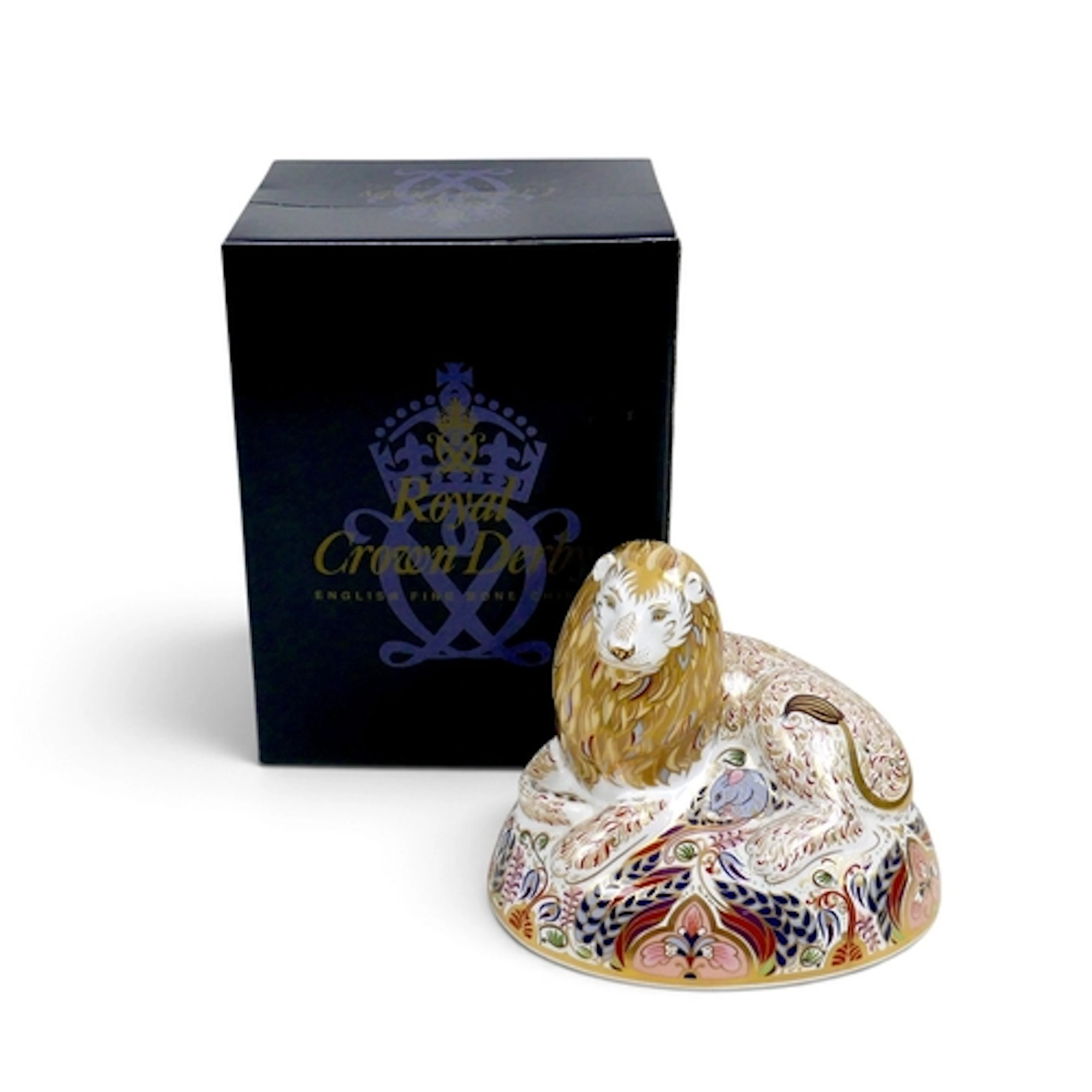 A ROYAL CROWN DERBY LION PAPERWEIGHT. 14cm high, with gold s...