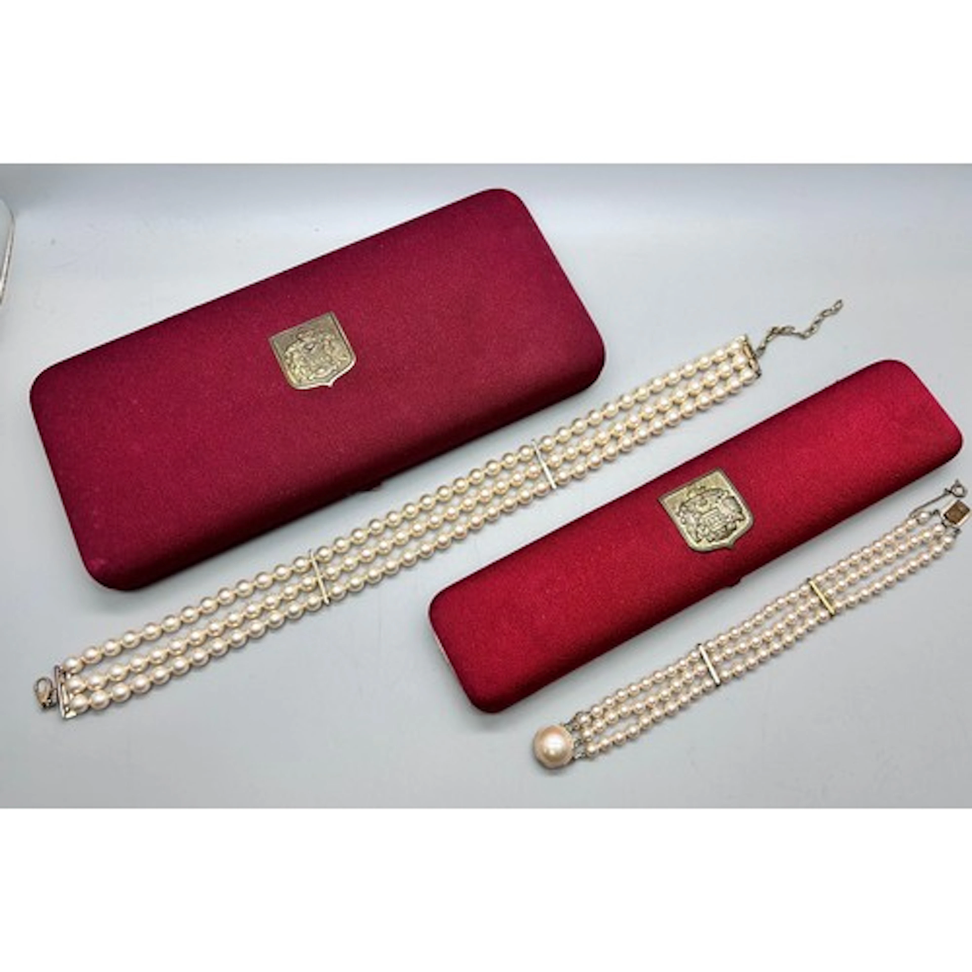 Two Majorica faux pearl necklaces with paperwork, boxed