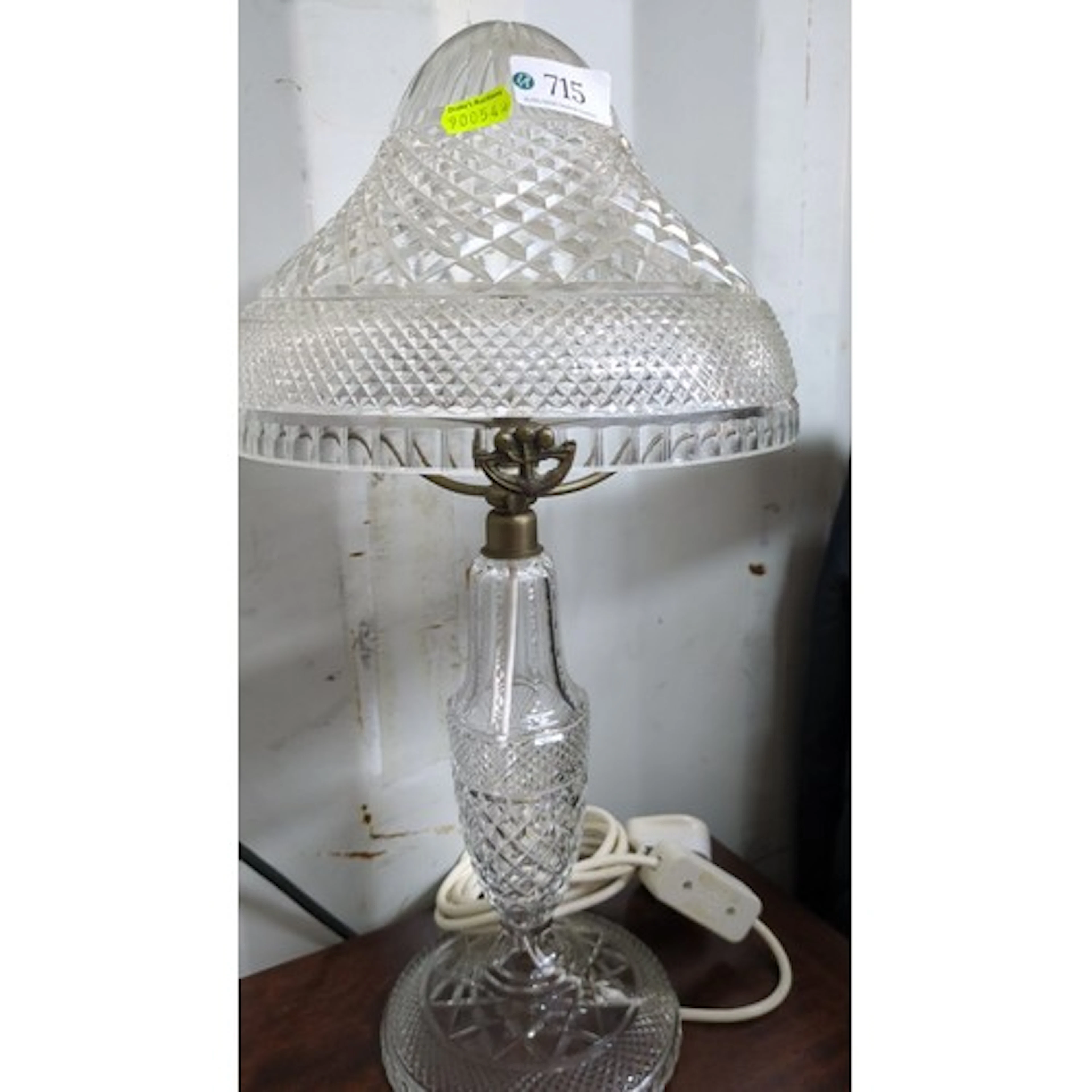 Cut-glass table lamp, the bell-shaped shade and baluster ste...