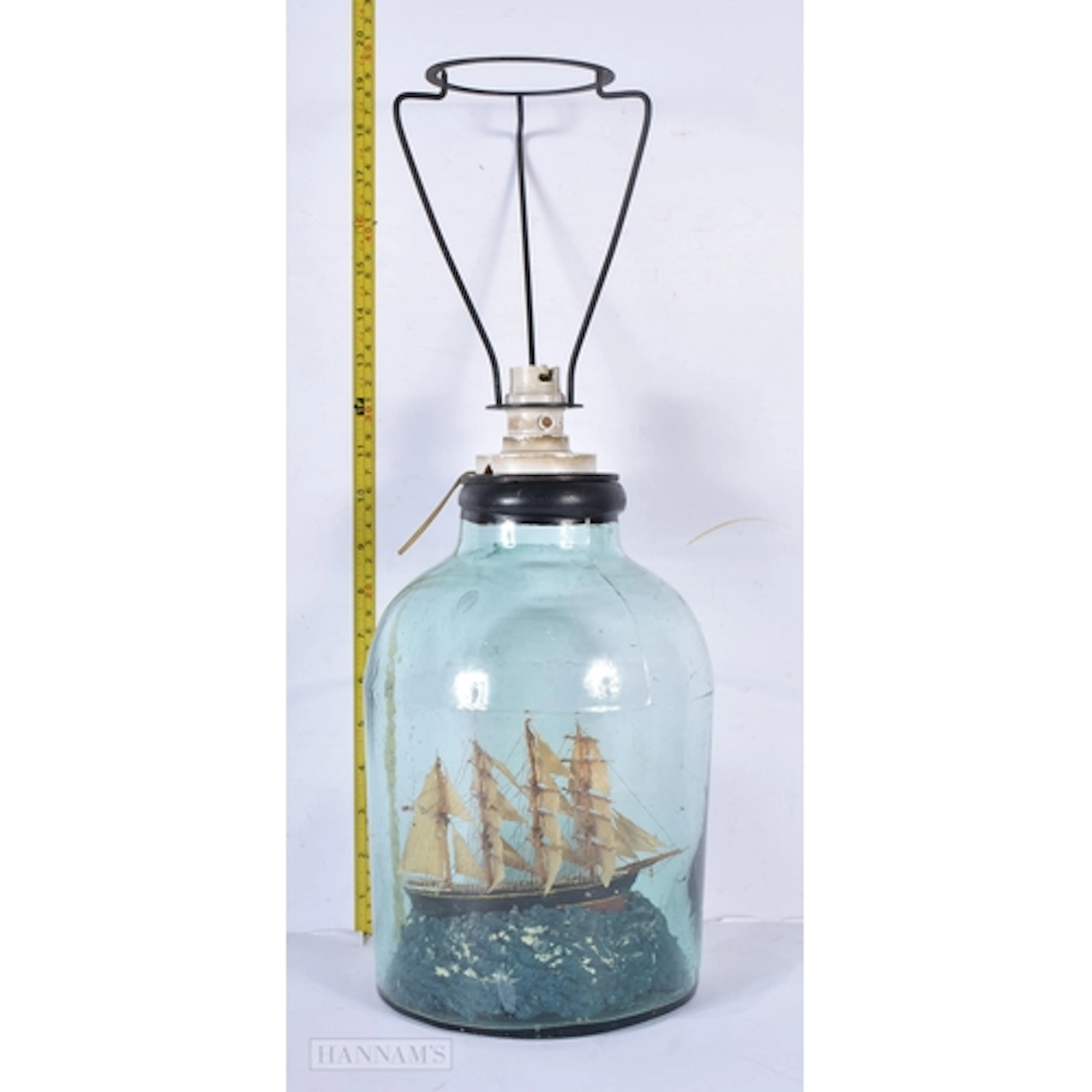 A vintage ship in a bottle lampstand 33cm