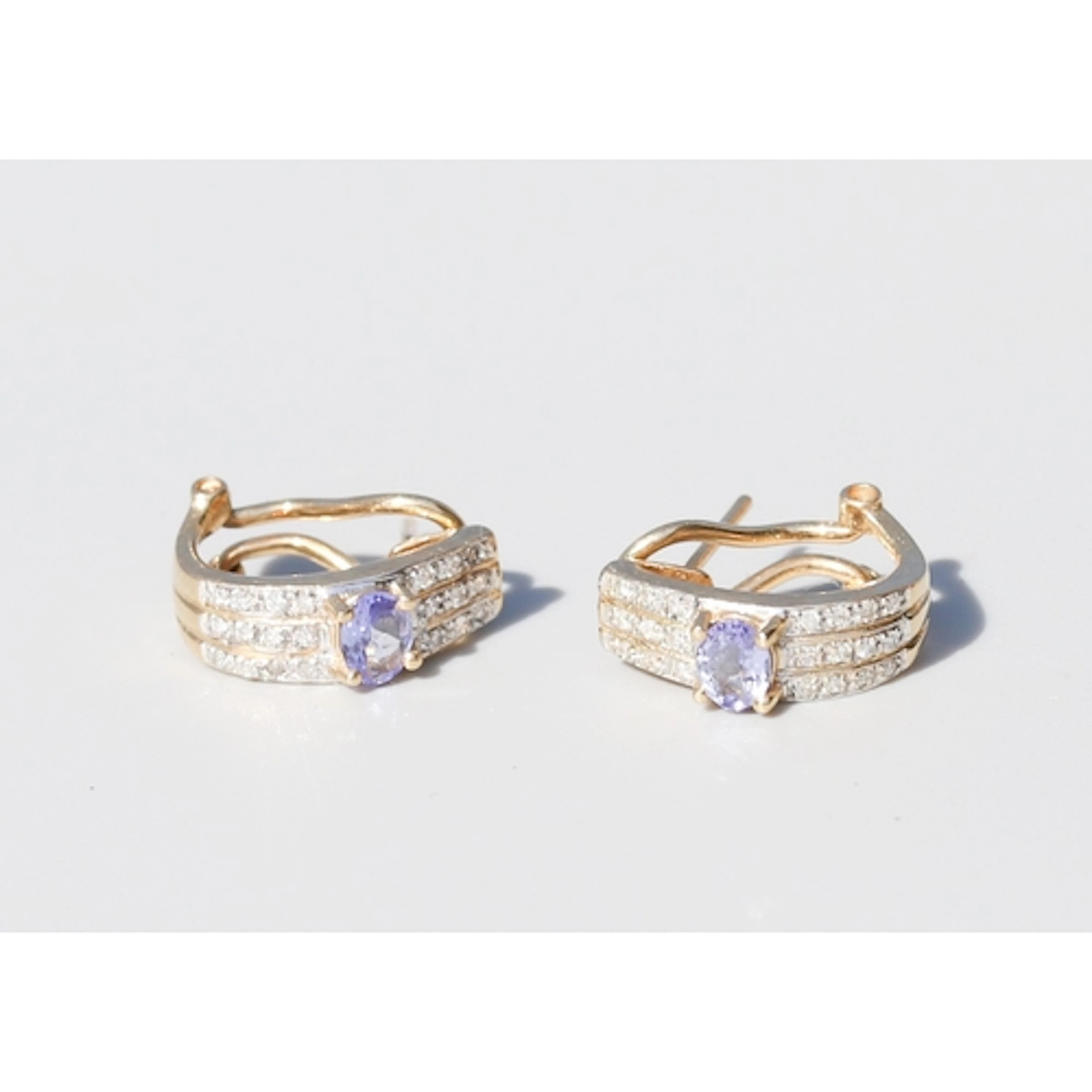 Pair of Finely Detailed, Tanzanite Set Earrings with Diamond...