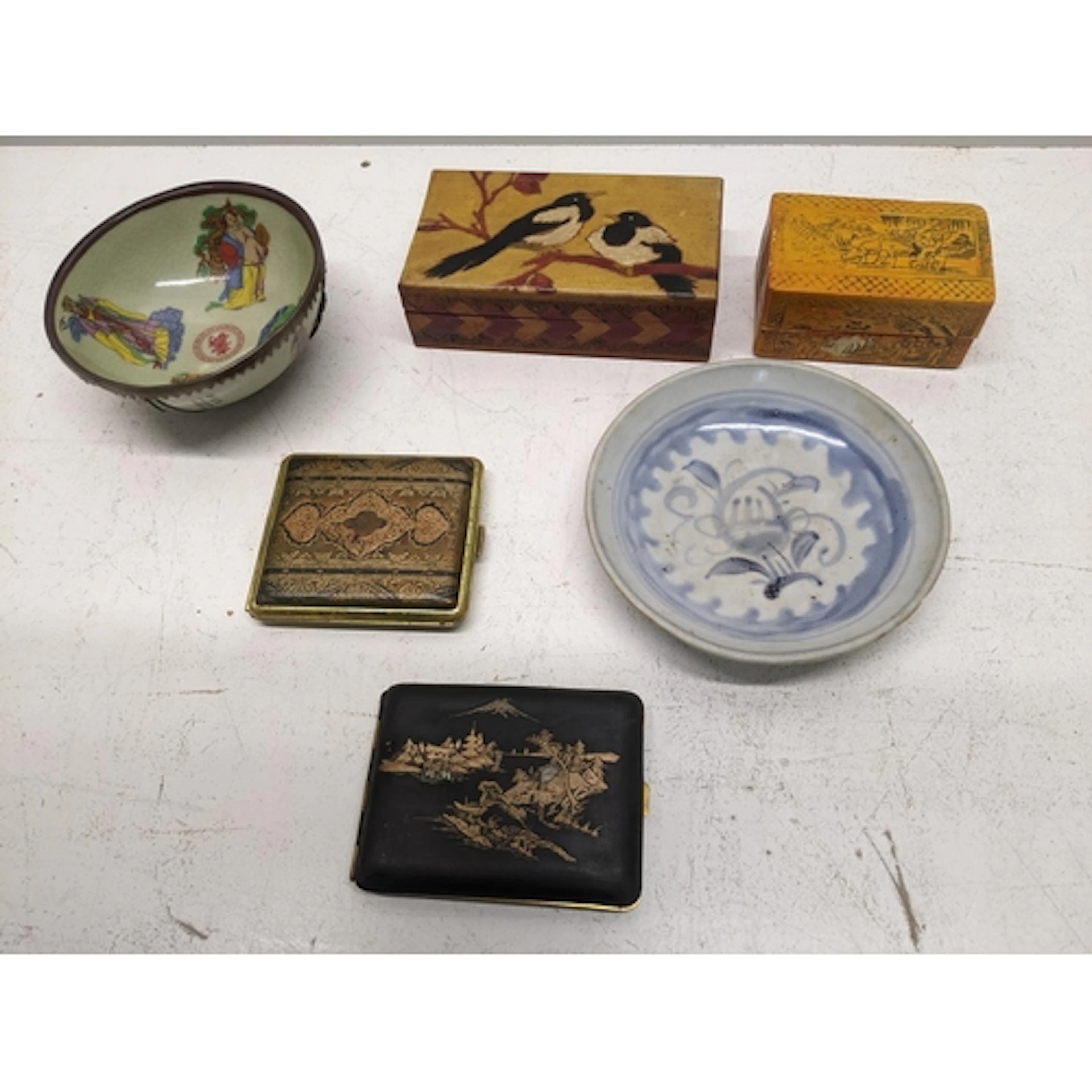 A mixed group of Asian and European ceramic, metal and woode...