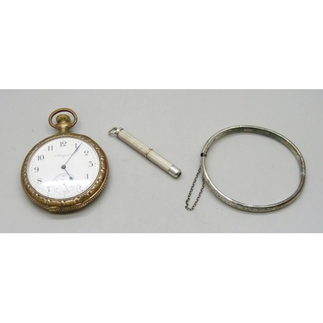 A gold plated pocket watch, a silver bangle, a/f, and a silv...