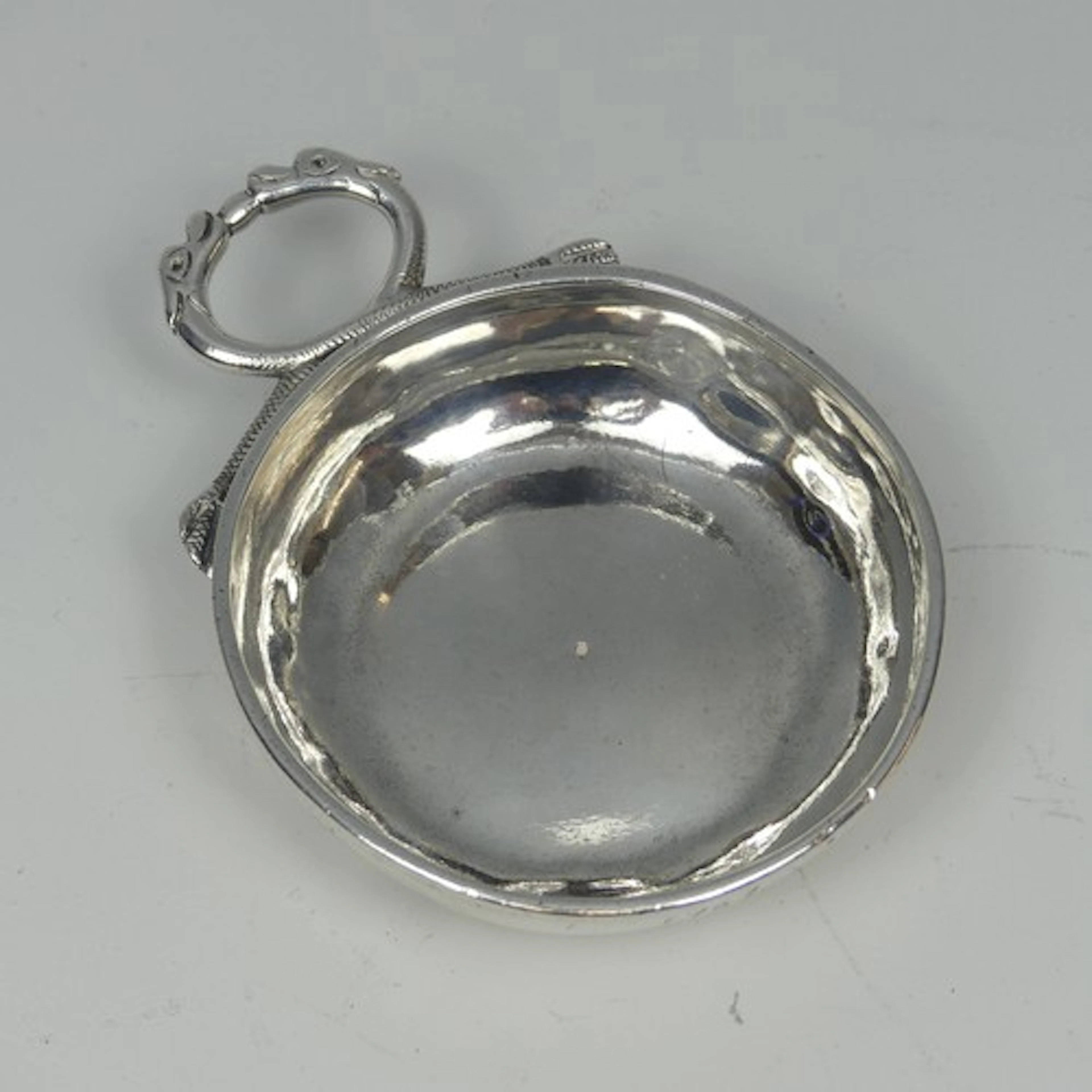 An 18thC French silver 'Tastevin' Wine Taster, of plain form...