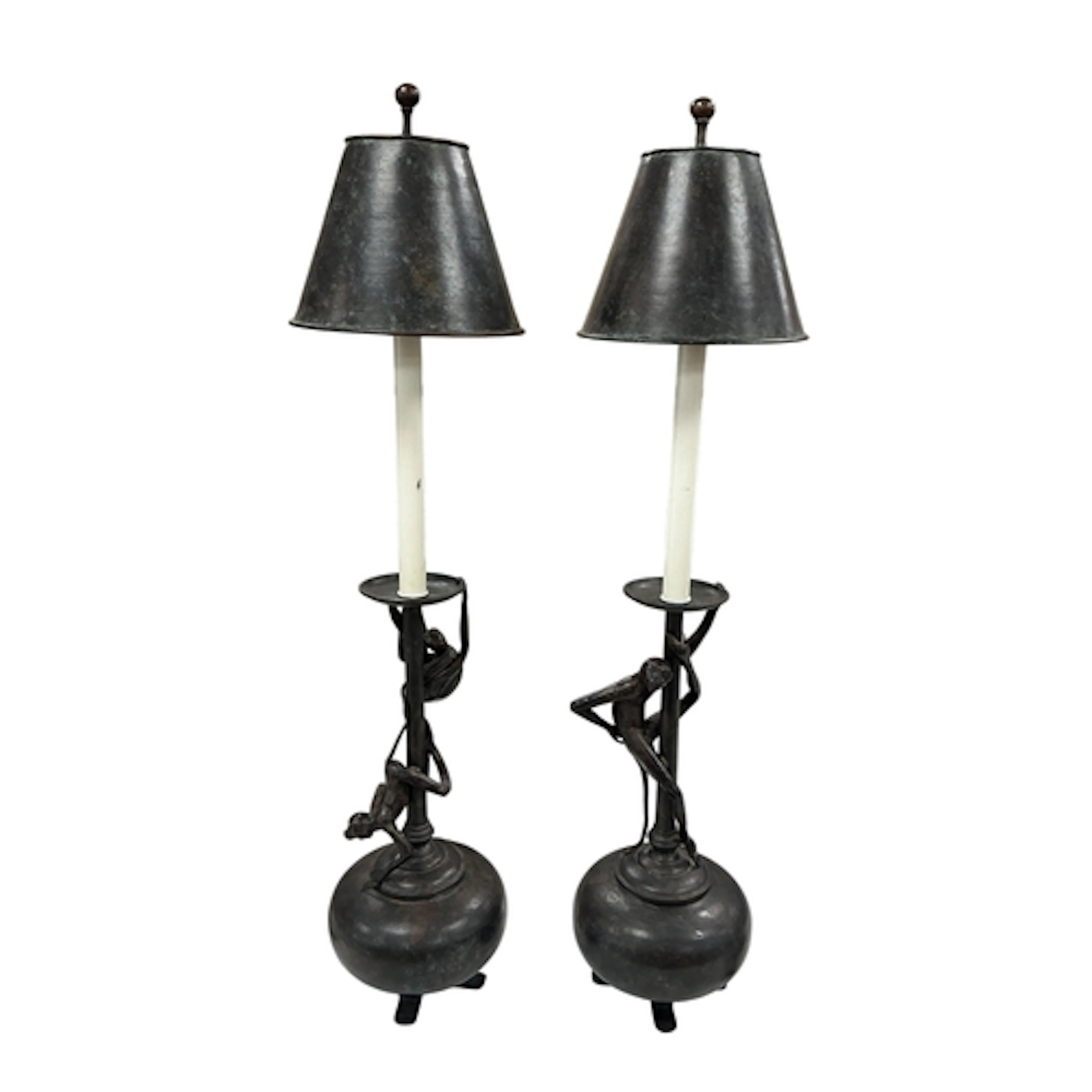 A pair of contemporary bronzed metal monkey table lamps with...