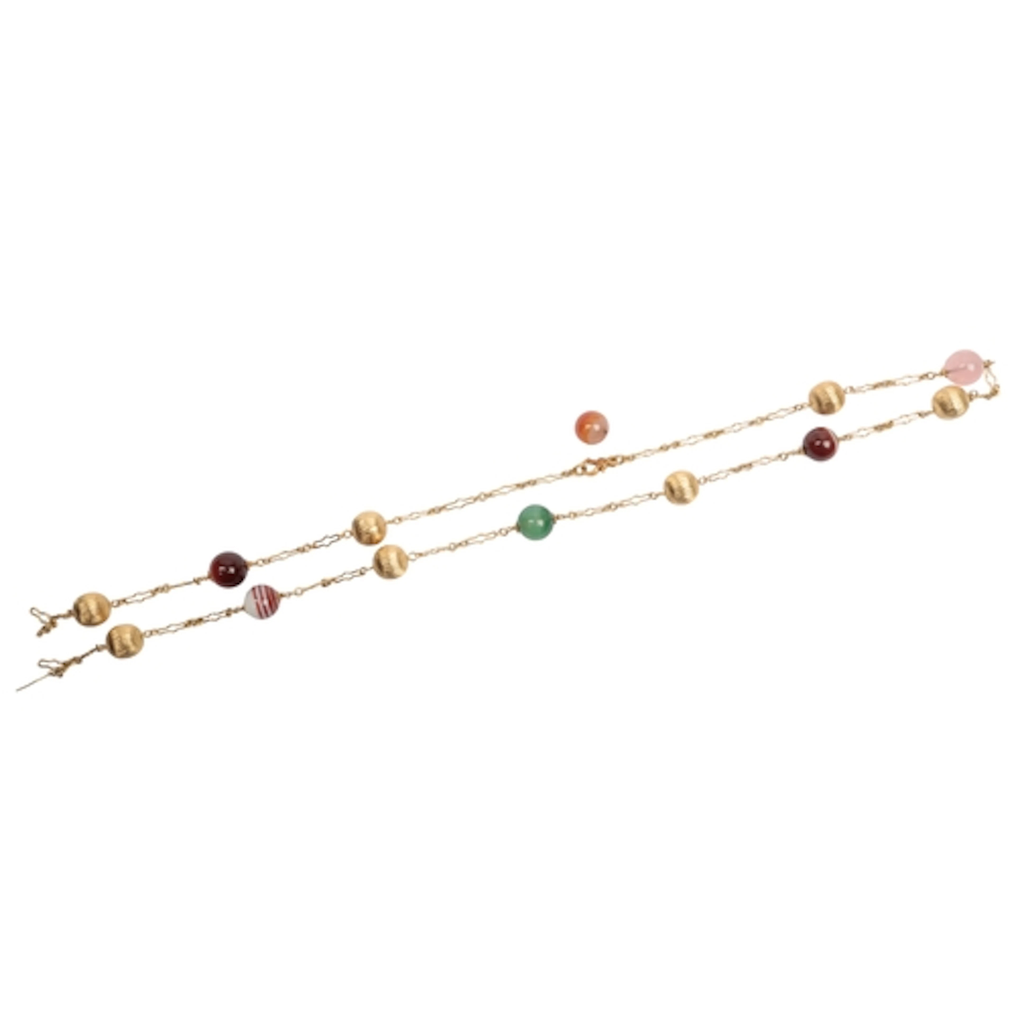 A gold and hardstone necklace, composed of hardstone and flu...