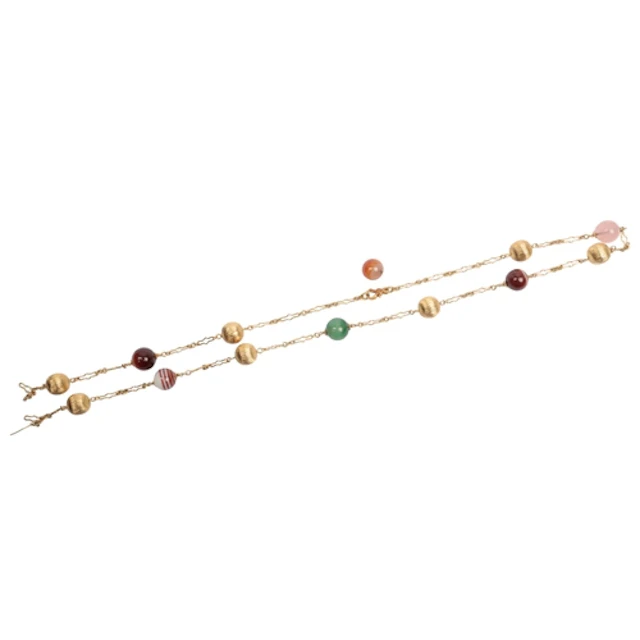 A gold and hardstone necklace, composed of hardstone and flu...