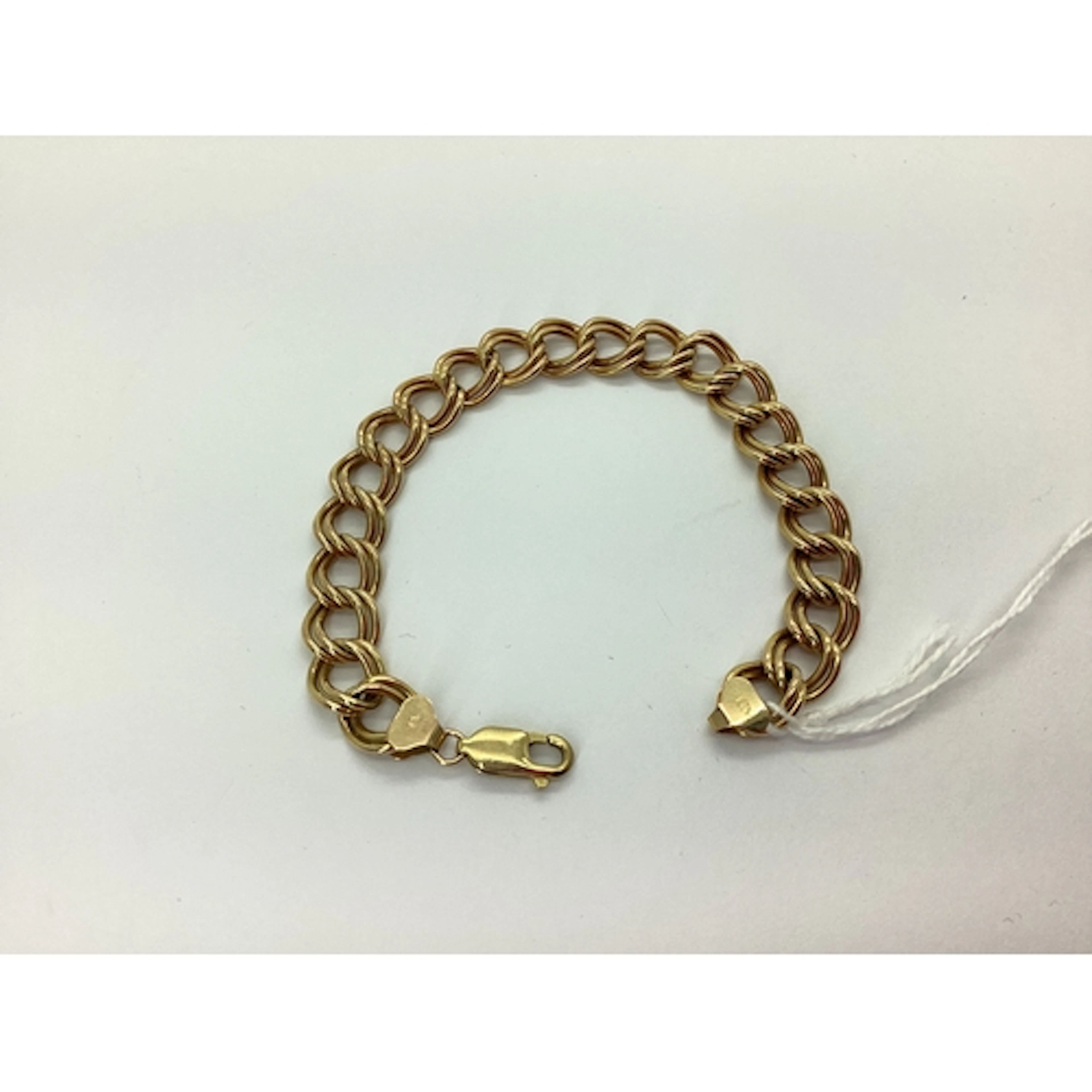 A 9ct Gold Double Curb Link Bracelet, 17.5cm long. Total wei...