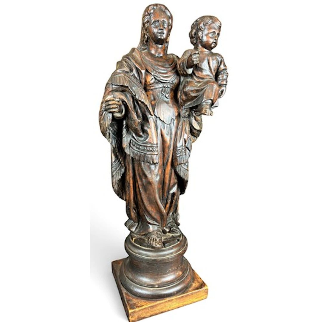 A large carved oak figure group, The Madonna and Child, cont...