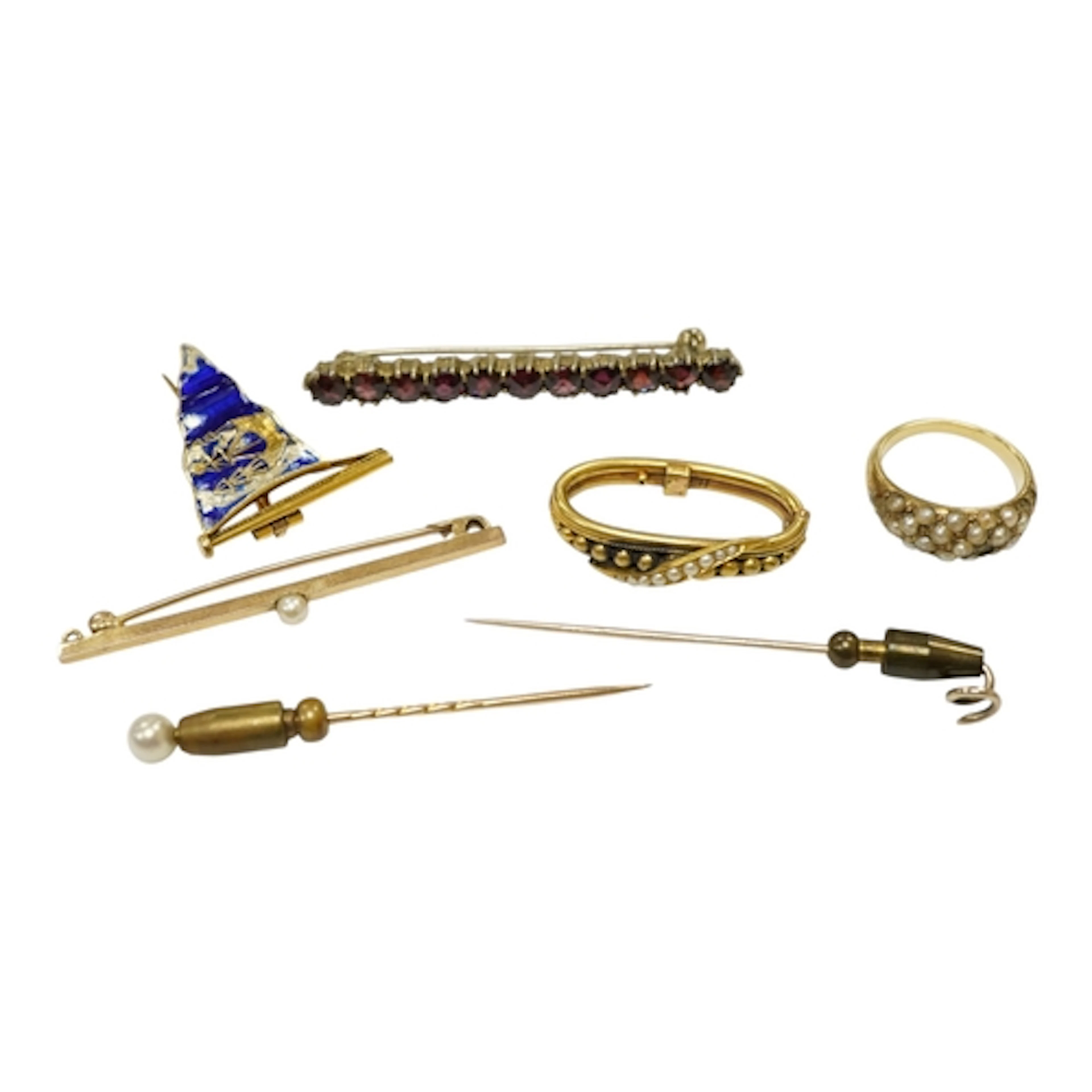 An Edwardian 15ct and seed pearl set scarf clip, a 9ct and e...