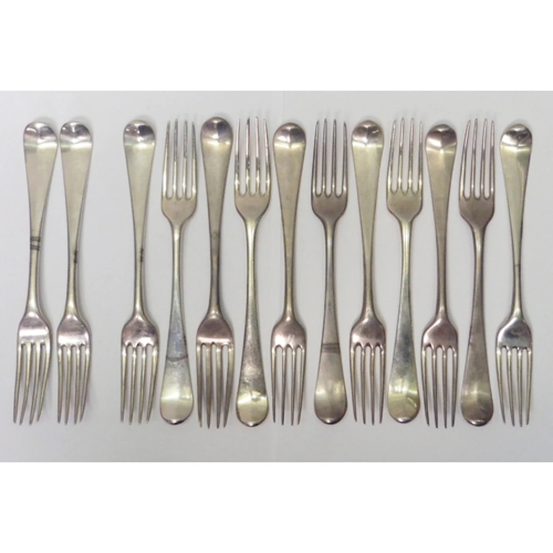 A matched set of eleven George II & III silver Hanoverian pa...