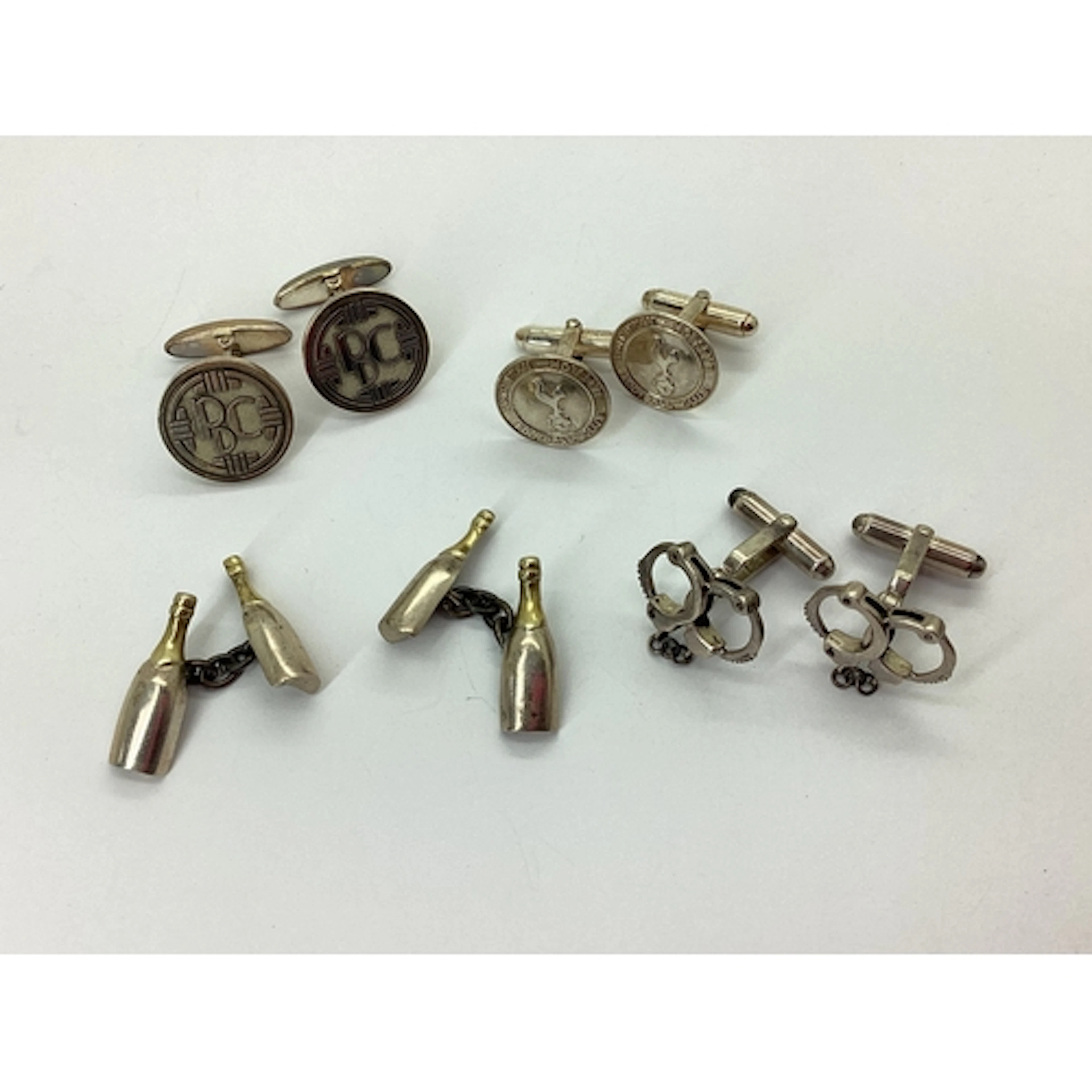 Links of London; A Pair of Hallmarked Silver Novelty Hand Cu...