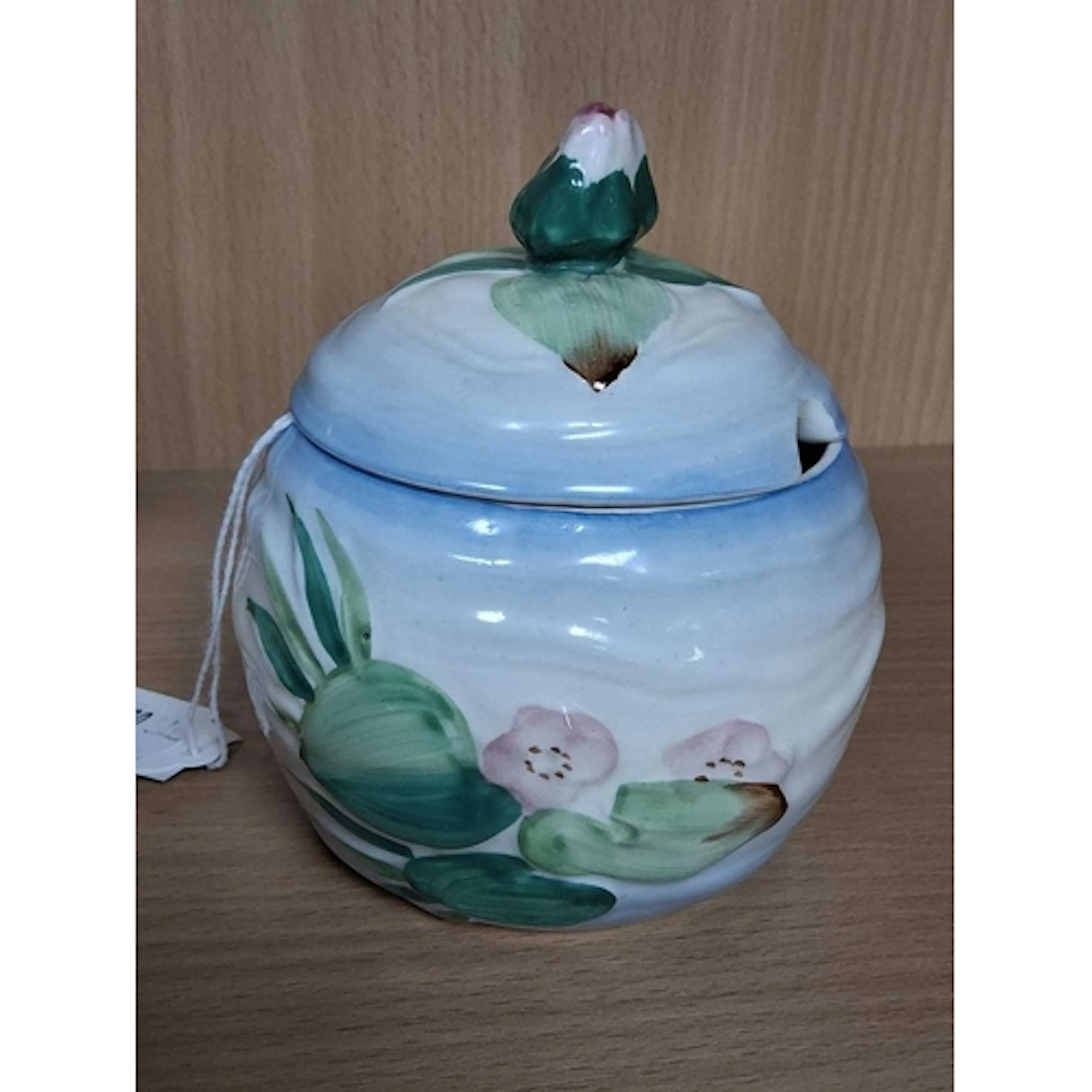 A CLARICE CLIFF WATER LILY PRESERVE POT, moulded with water ...