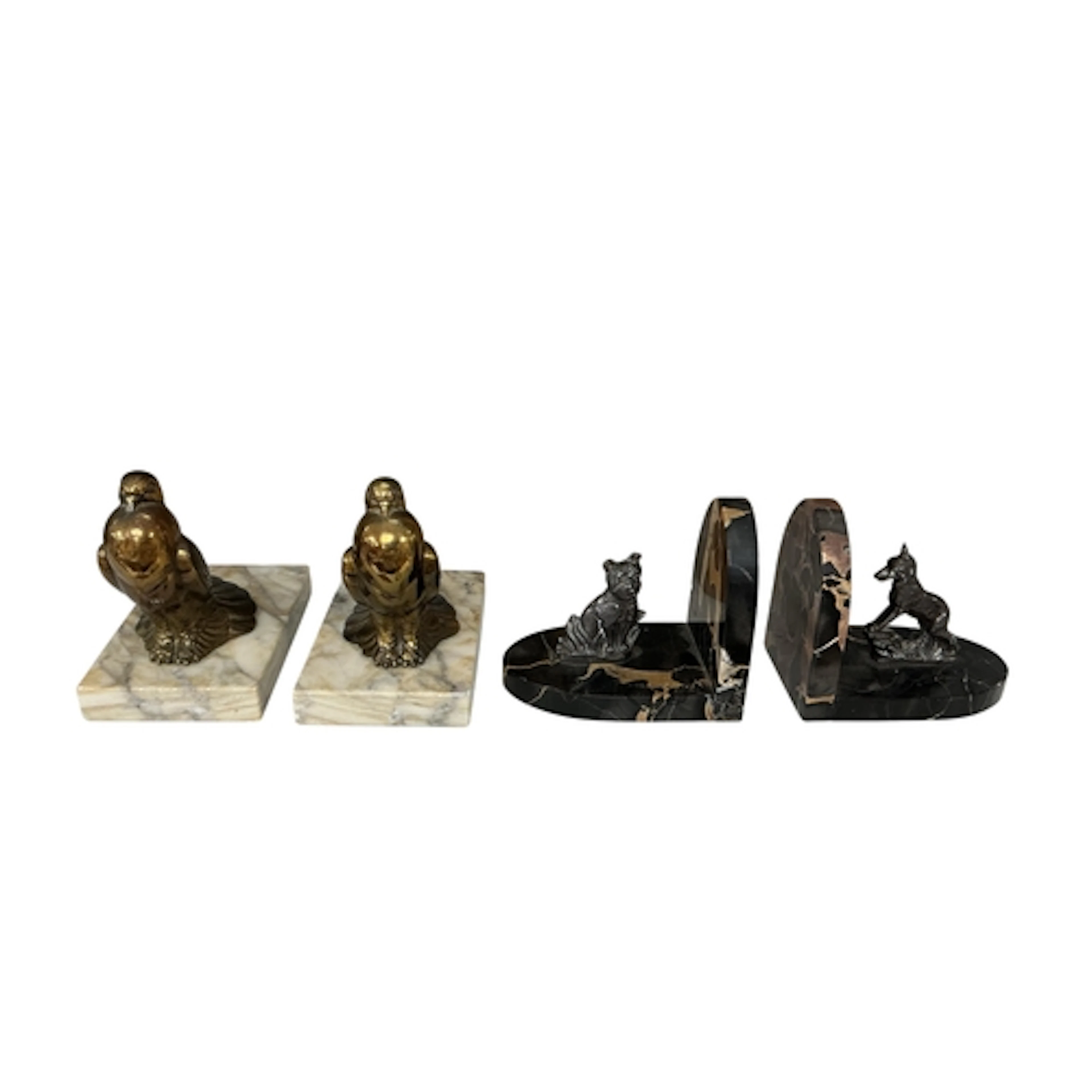 Two pairs of French Art Deco spelter and marble bookends cas...