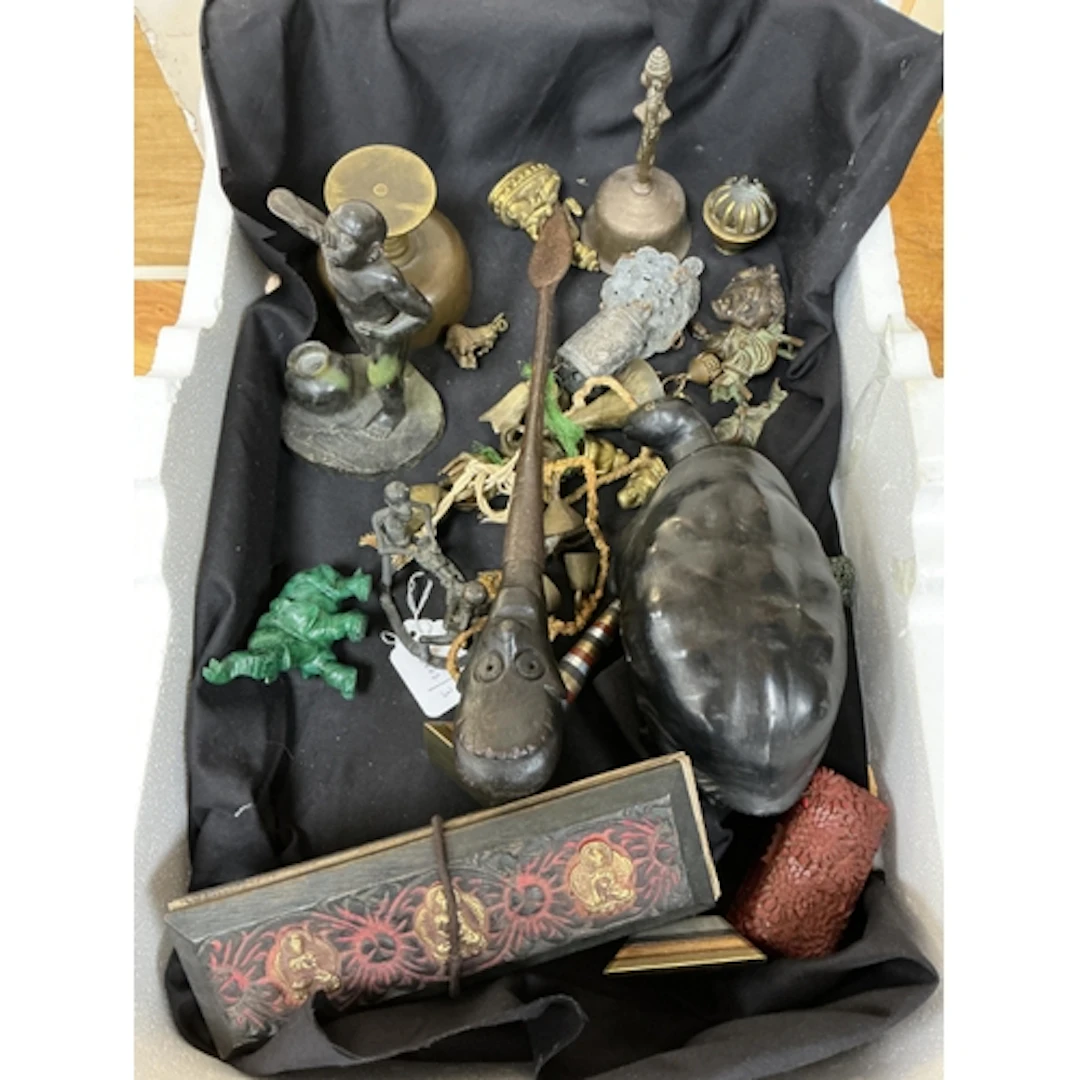 A quantity of assorted African and South East Asian artefact...