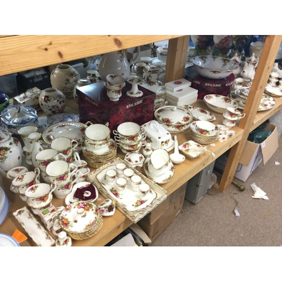 A large Royal Albert country rose set including plates, cups...