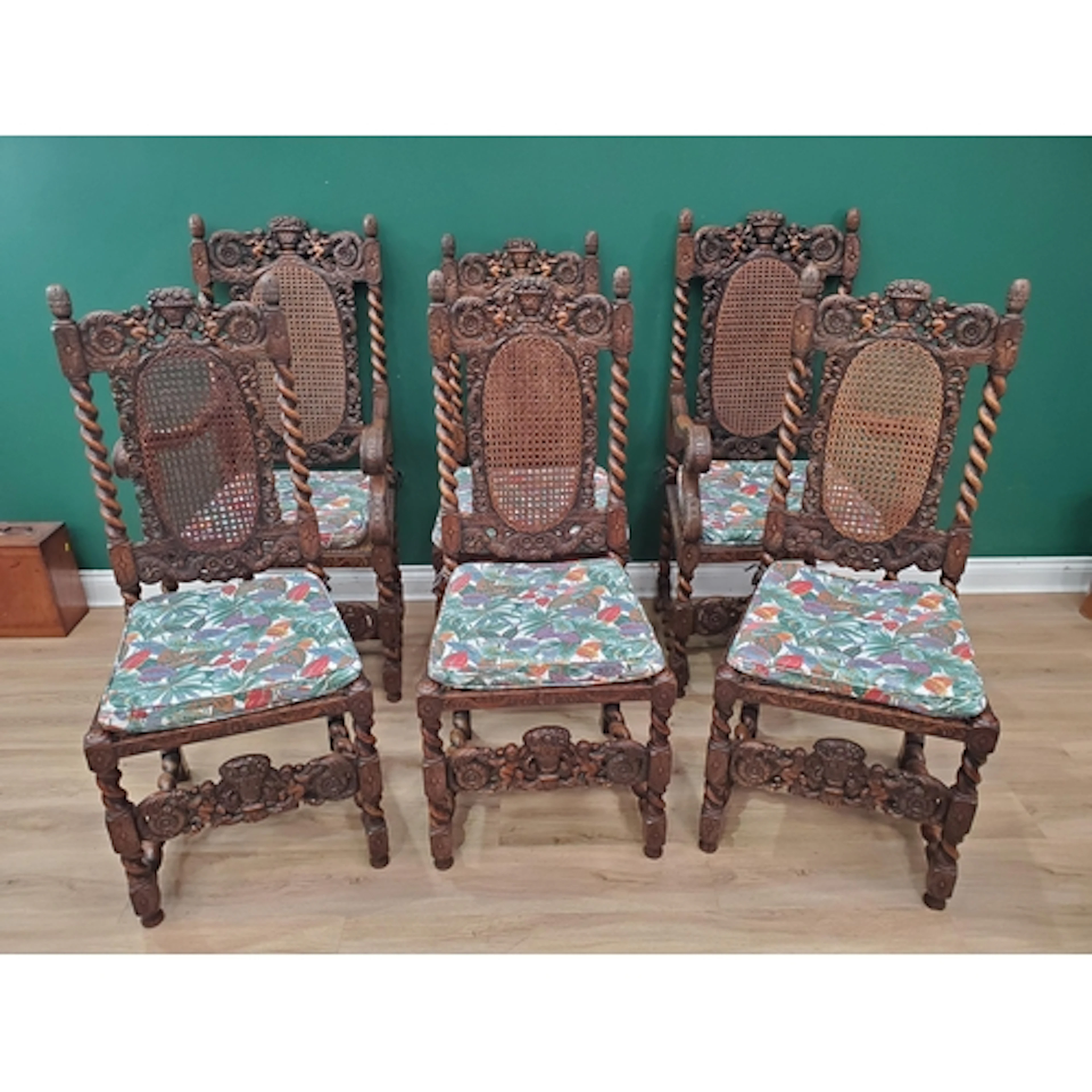 A set of six Carolean style Dining Chairs, the elaborately c...