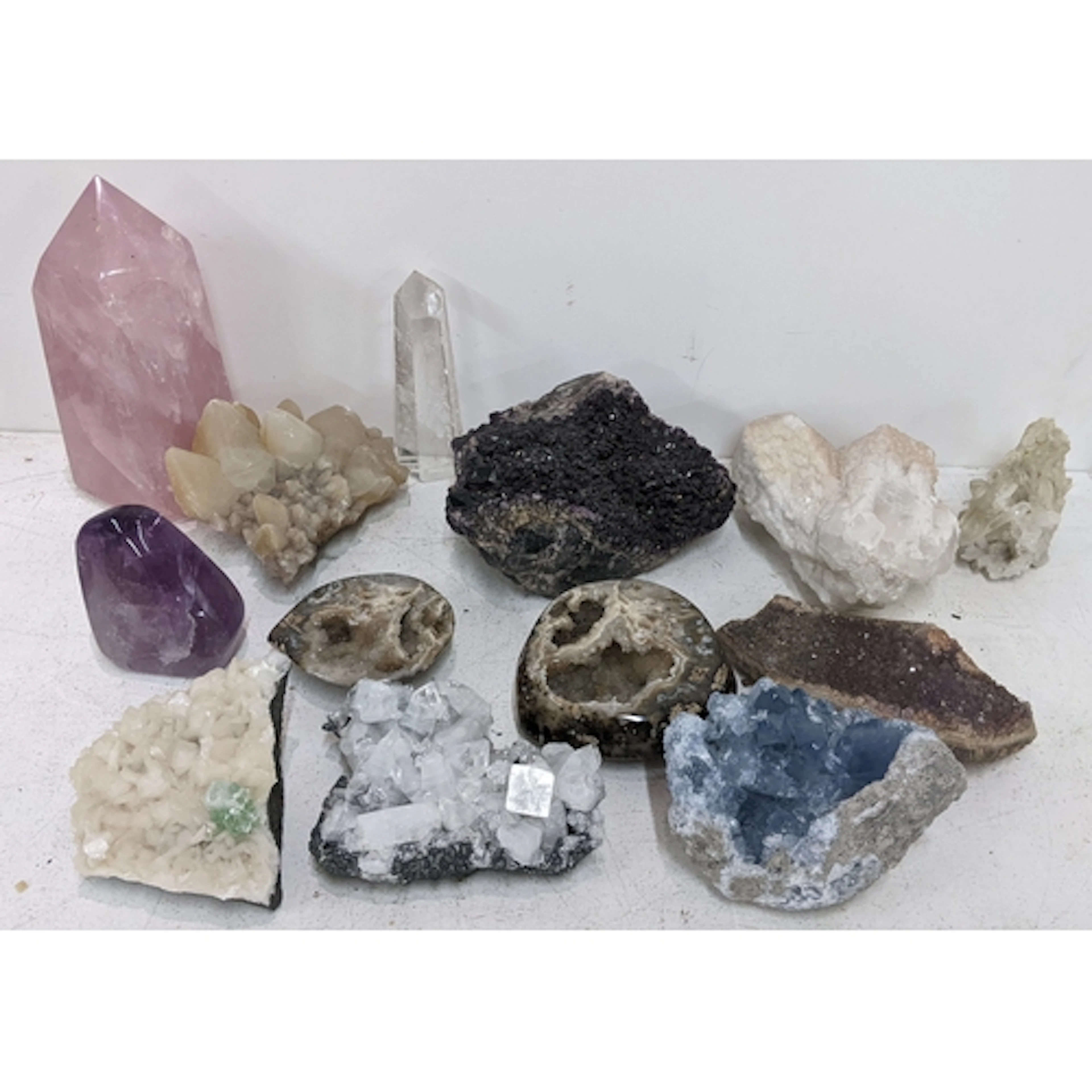 A collection of mineral specimens and polished stones to inc...