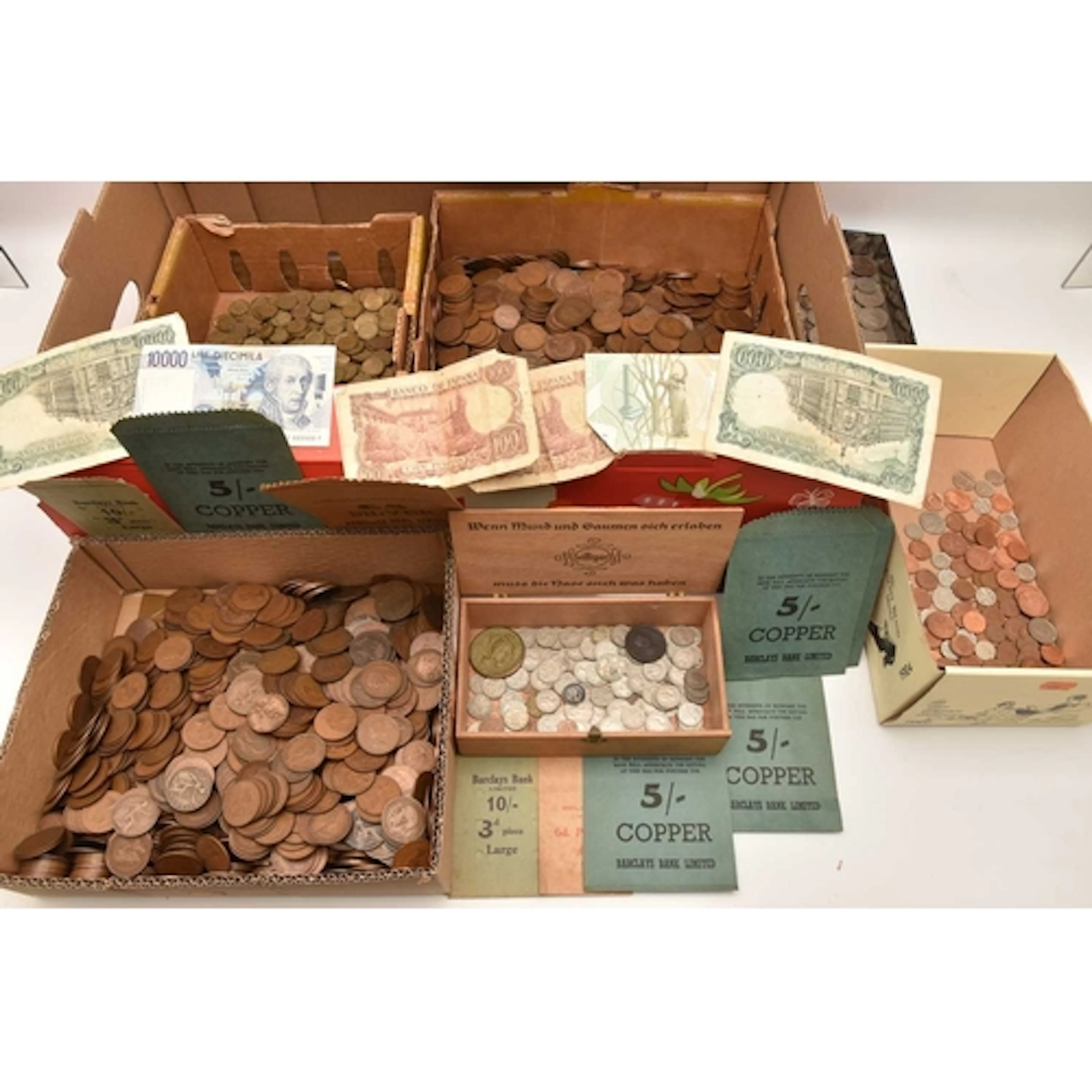 A cardboard box containing a huge quantity of mixed UK and f...