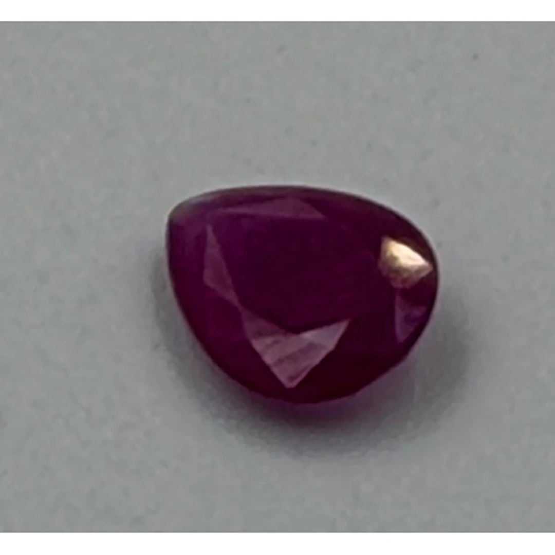 A pear shape Burmese ruby. 1.01 carats Clarity SI with suppo...