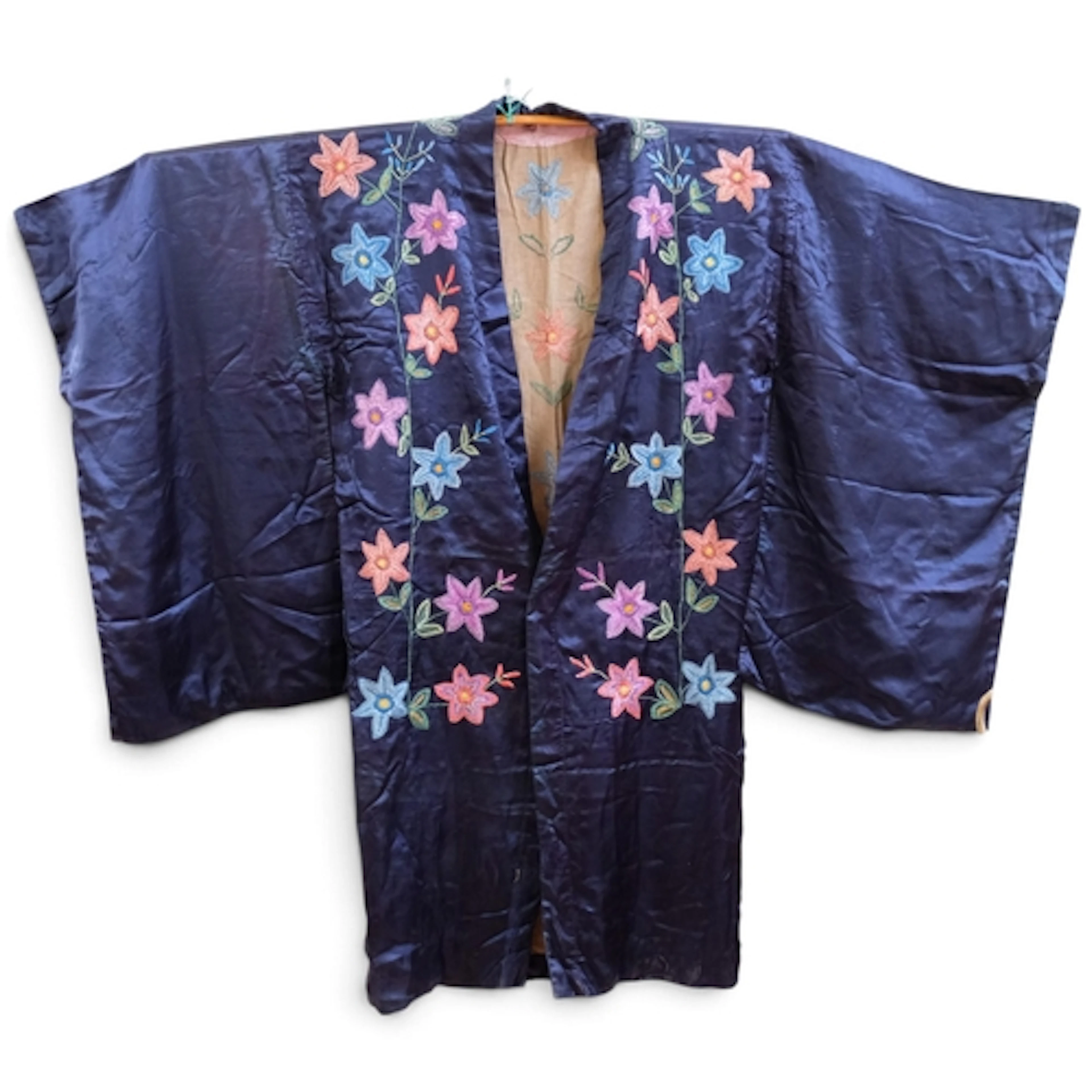 A Japanese dark blue silk kimono, with floral embroidered de...