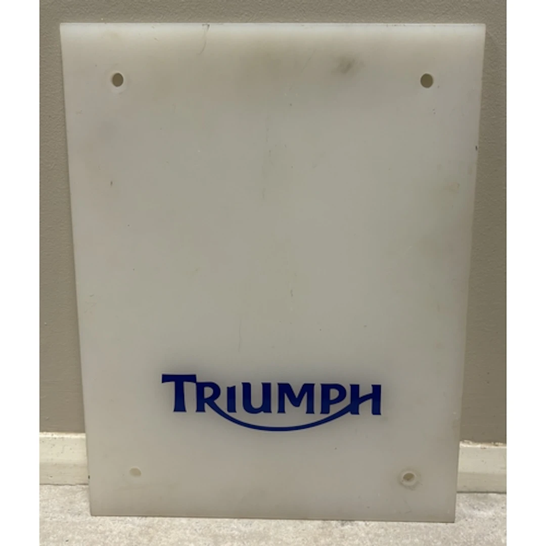 A plastic Triumph advertising sign. Approx. 38cm x 49cm. Est...