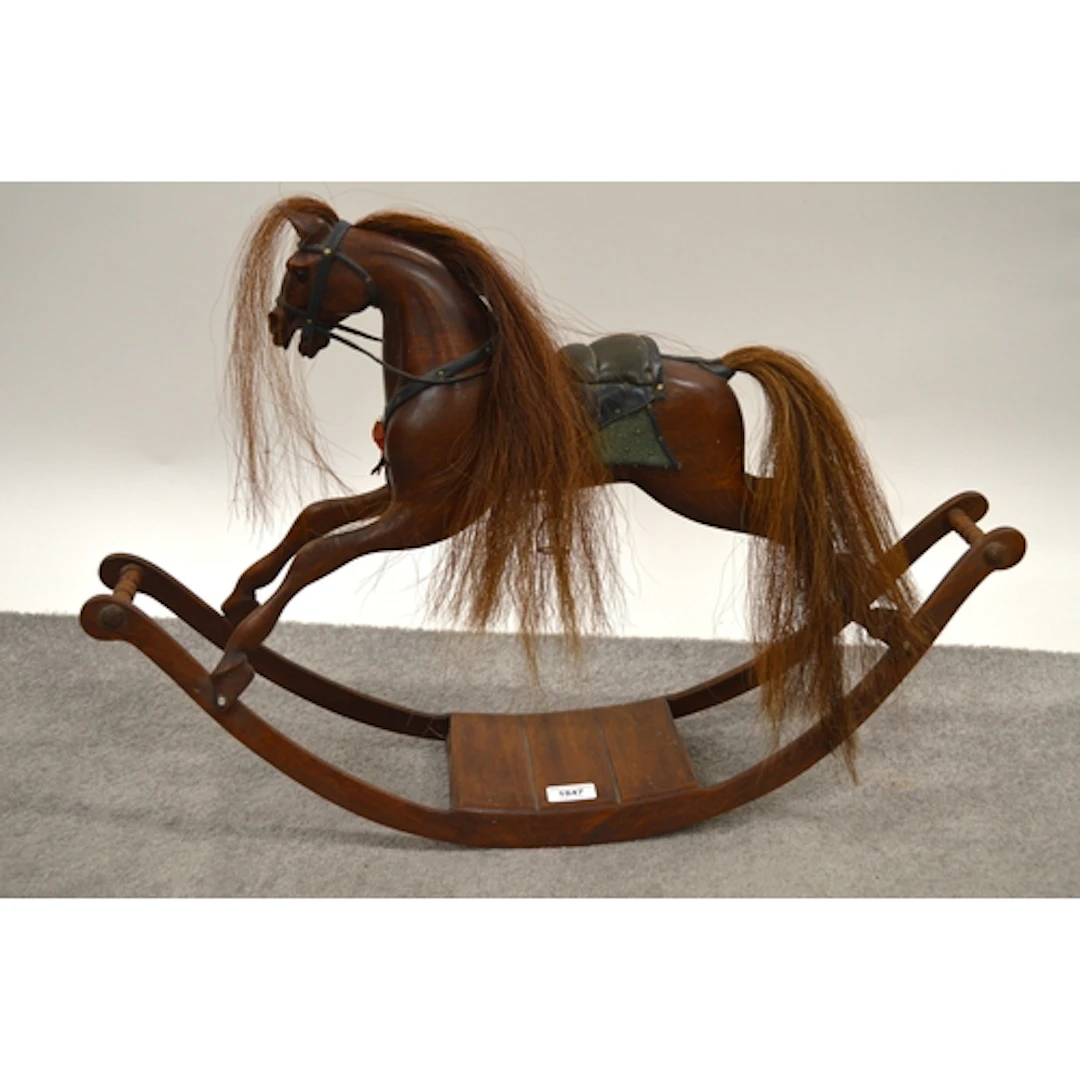 Modern miniature carved and painted rocking horse