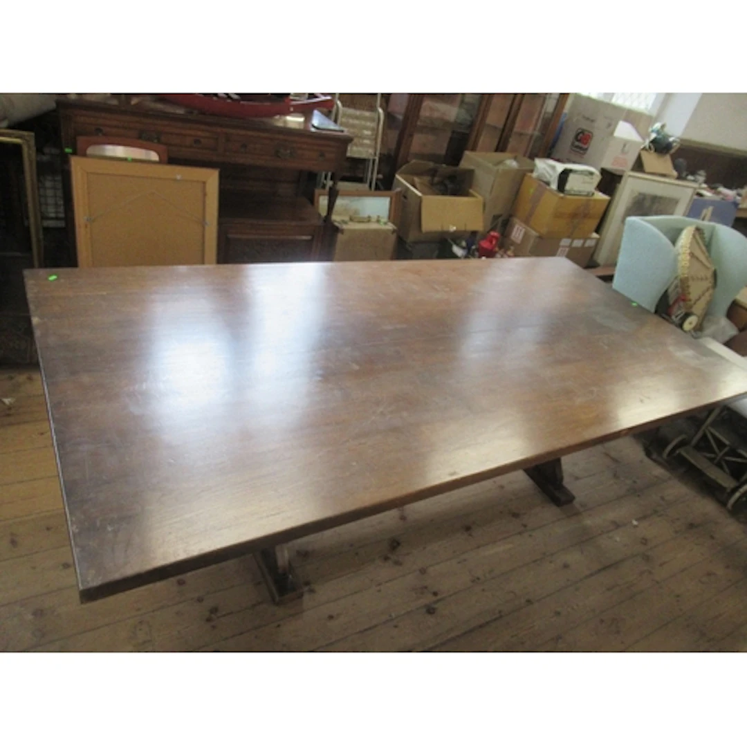 An oak dining table 48ins x 102ins height 30ins