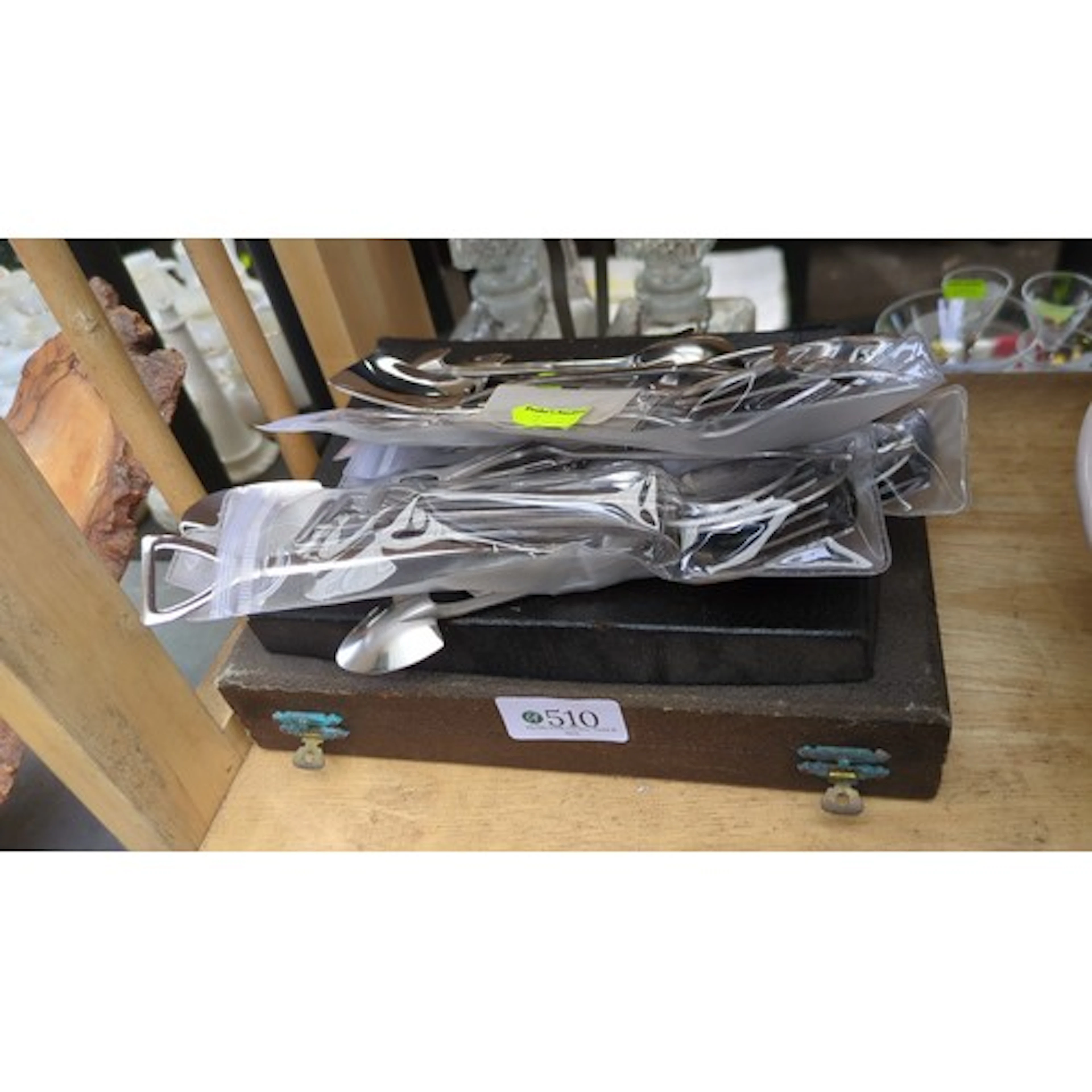 A collection of silver-plated flatware and serving implement...