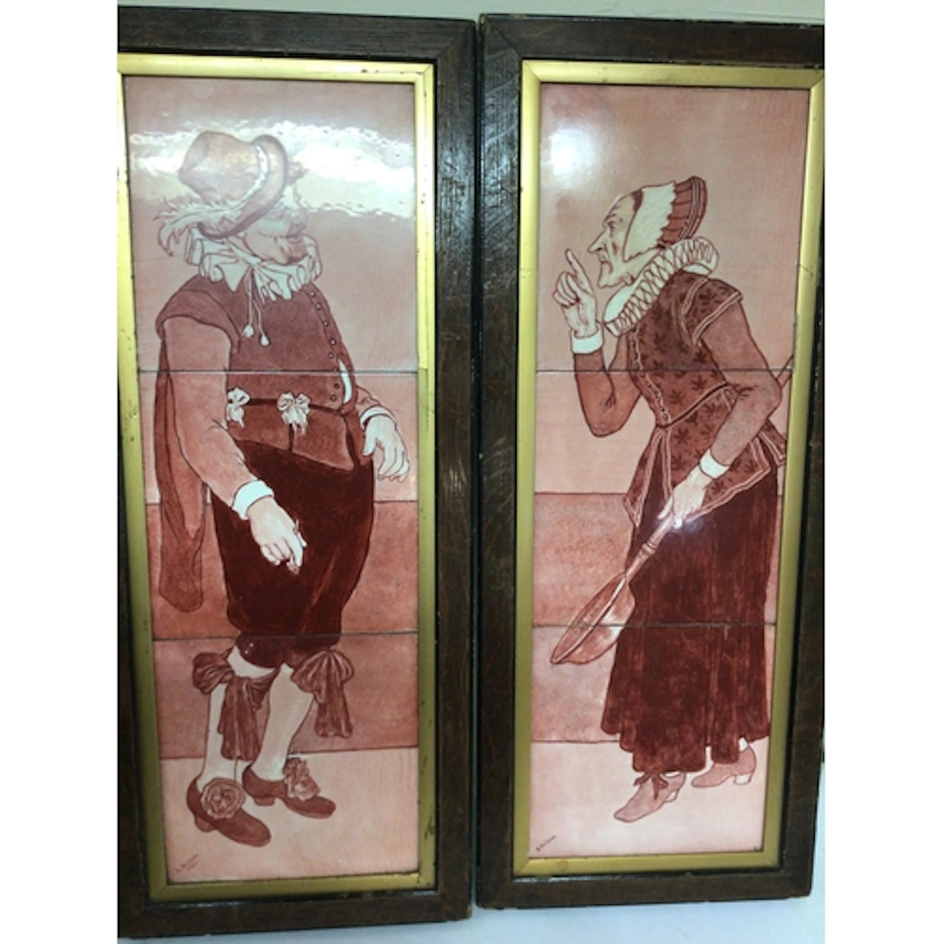 A pair of painted continental 19th century red tile pi...